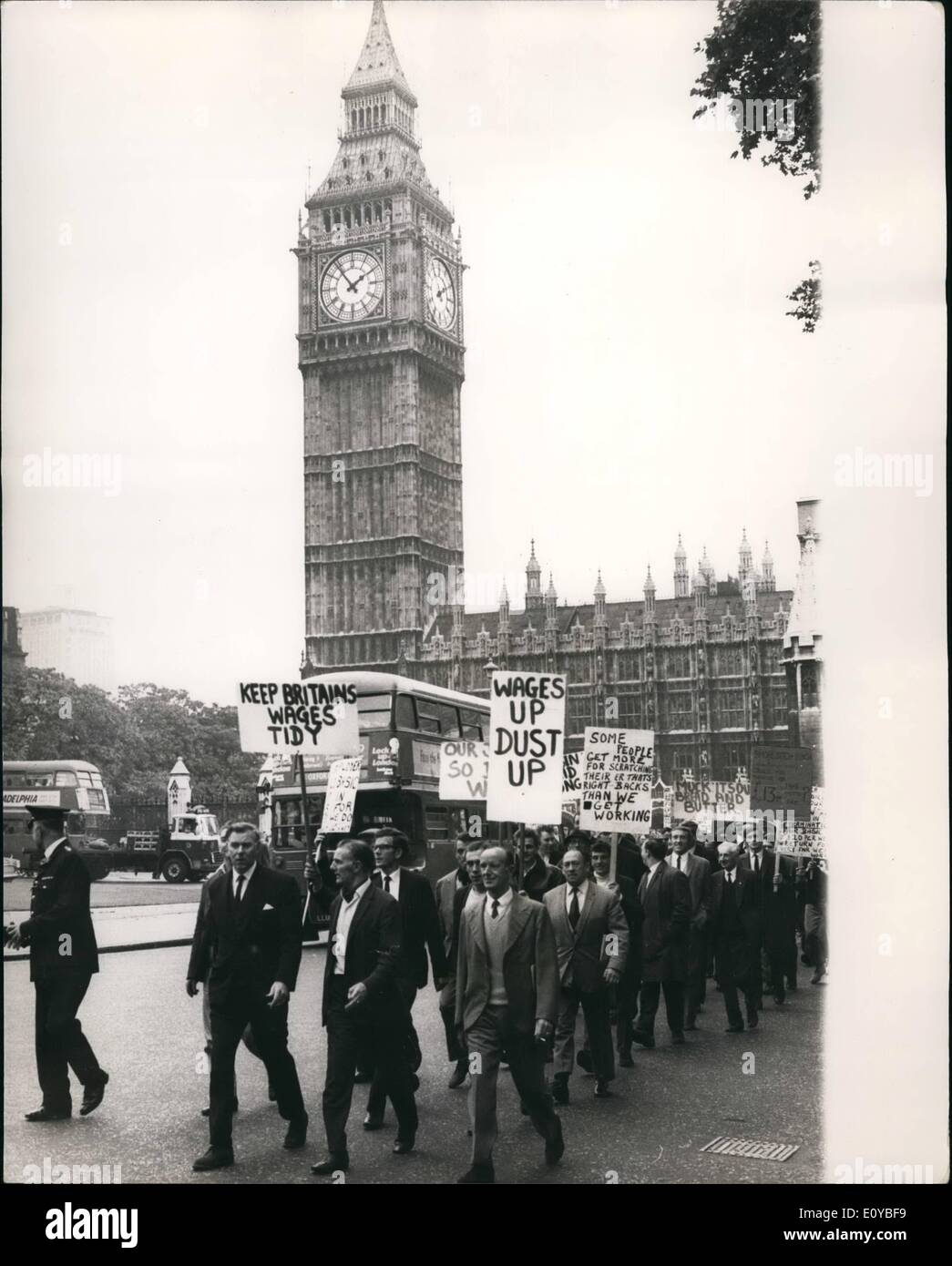 Oct. 10, 1969 - Striking Dustmen march to Caxton Hall: Striking London dustmen today marched to Caxton Hall today, where emergency talks between borough council employers and trads union leaders were taking place, in an attempt to and the dustmen strike. Photo shows Dustmen seen in Westminster today as they marched to Caxton Hall. Stock Photo
