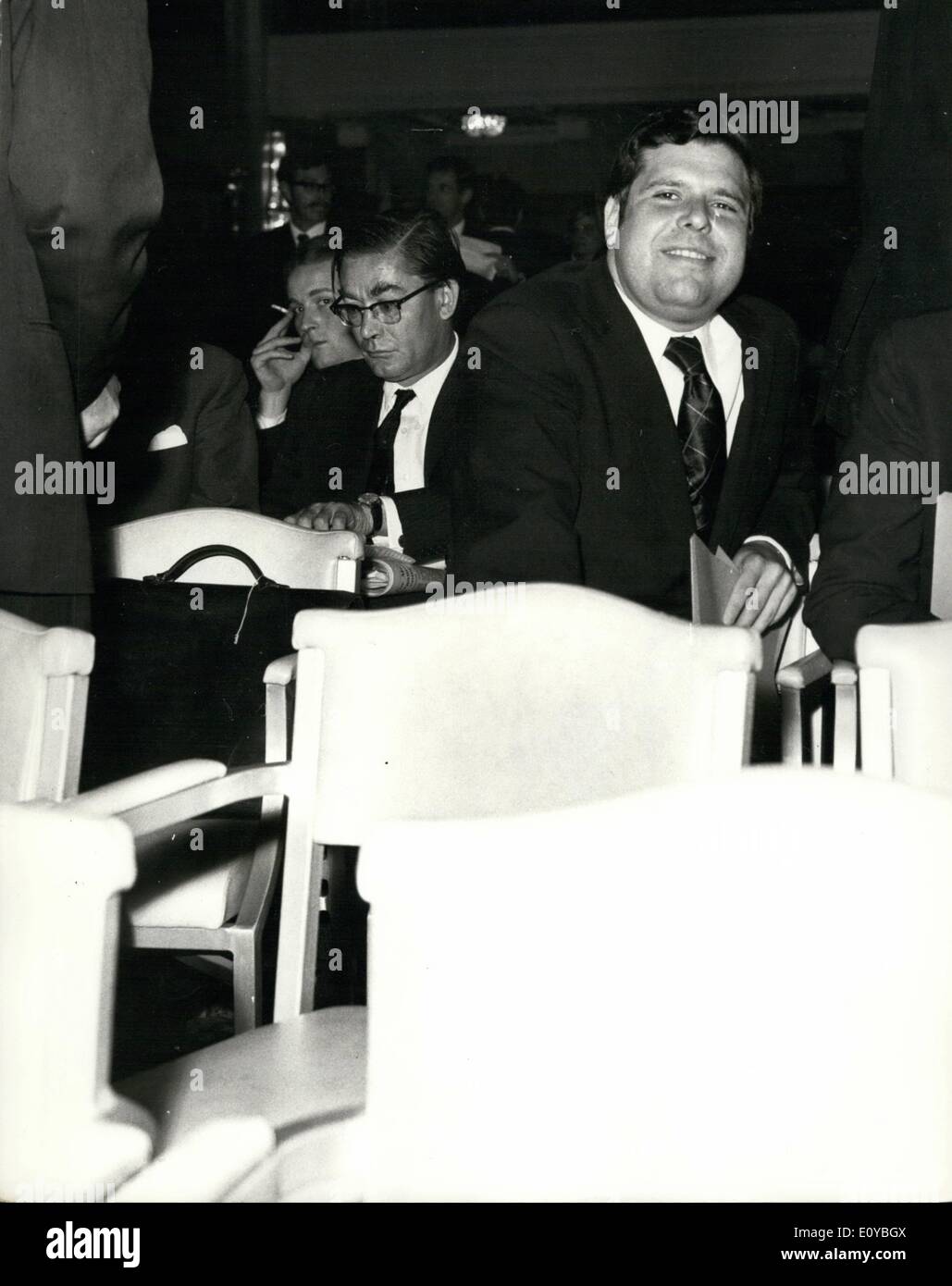Oct. 10, 1969 - Uproar At Meeting Of Pergamon Press Shareholders At The Connaught Rooms: As Mr. Robert Maxwell, Labour MP and Chairman of Pergamon Press was about to open the meeting of Shareholders who were their to decide whether Mr. Saul Steinberg's Leasee team should take over management control of Pergamon from Mr. Maxwell, four men jump up onto the Platform and one of them solicitor, tried to speak to the meeting. After a few minutes he left the platform as the microphones went dead and the shareholders were chanting and hand with his three colleagues. Photo shows Mr Stock Photo