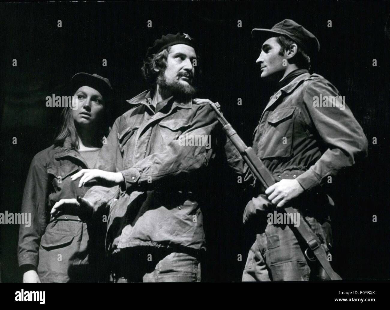 Oct. 16, 1969 - Joerg Wehmaier produced the John Spurling play ''Che Guevara,'' about the famous Cuban guerrilla leader. The piece premiered in Stuttgart's Staatstheater. Pictured here are actors in a scene from the play. From left to right are: M. Dickow, B. Huebner(as Che) and Wolfgang Decker. Stock Photo