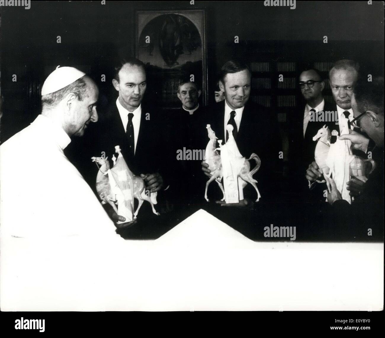 Oct. 18, 1969 - The Pope Meets the American Lunarauts: During their visit to Rome, the three American lunarauts, Neil Armstrong, Col. Edwin Aldrin and Col. Michael Collins met the Pope during a private audience at the Vatican. Photo shows Pope Paul presents the three American lunnarauts (L. to R.) Michael Collins, Neil Armstrong and Edwin Aldrine, with statues of the Three Wise Men. Stock Photo