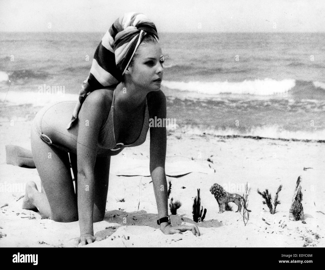 Oct 28, 1969; Sardinia, Italy; Sixteen year old CAROLE ANDRE co-stars with the swimmer turned actress Christine Caron in the film 'The Sea Lily' now in the making in Sardinia. The picture shows Carole Andre pictured in a scene on a beach. Stock Photo