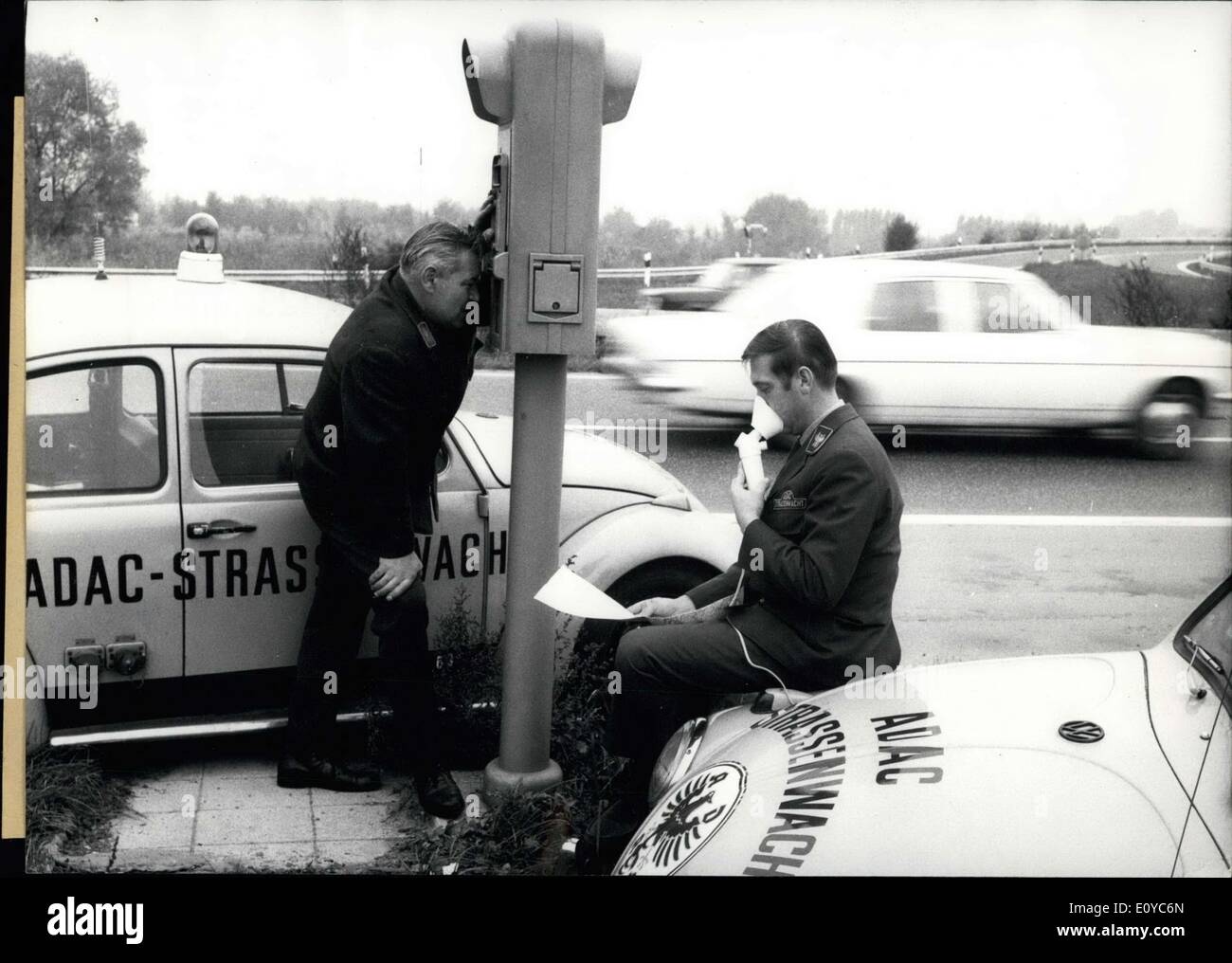 Oct. 29, 1969 - The drivers of the ADAC-Strassenwacht, or road patrol, are known as ''yellow angels.'' These cars patrol the streets of Germany in any condition, whether it be snow or rain or shine, in order to help in cases like accidents or car breakdowns. Here one is aiding a man with a mask. There are around 500 of them on duty, they have helped in over 372,265 cases, and they have driven a collective 12,000,000 km. Stock Photo