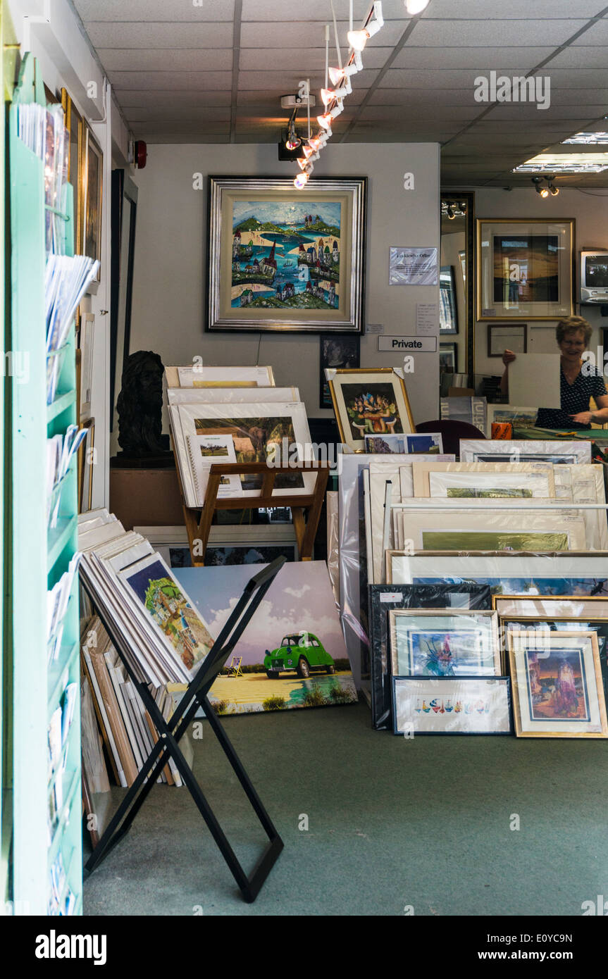 Looking into an art shop in Plymouth with many varied prints and