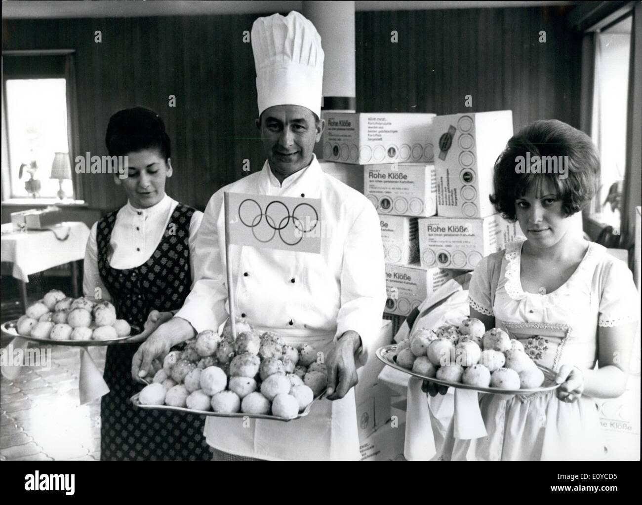 Nov. 11, 1969 - A record-eater..is Walter Lessig, 34 year old, from Munich, In 45 minutes he ate 36.5 ''Knodel'' ( a Bavarian and Austrian specialty). He will participate the 29th of this month at the International ''Knodel'' 0- week in Salzburg in a competition between Germany and Austria. His chances are very good and we only can wish him good appetite. By the way, the win out of this performance is promised to the Olympic-Company. Photo Shows Three specialists preparing the ''Knodels'' for the Salzburg performance. Stock Photo