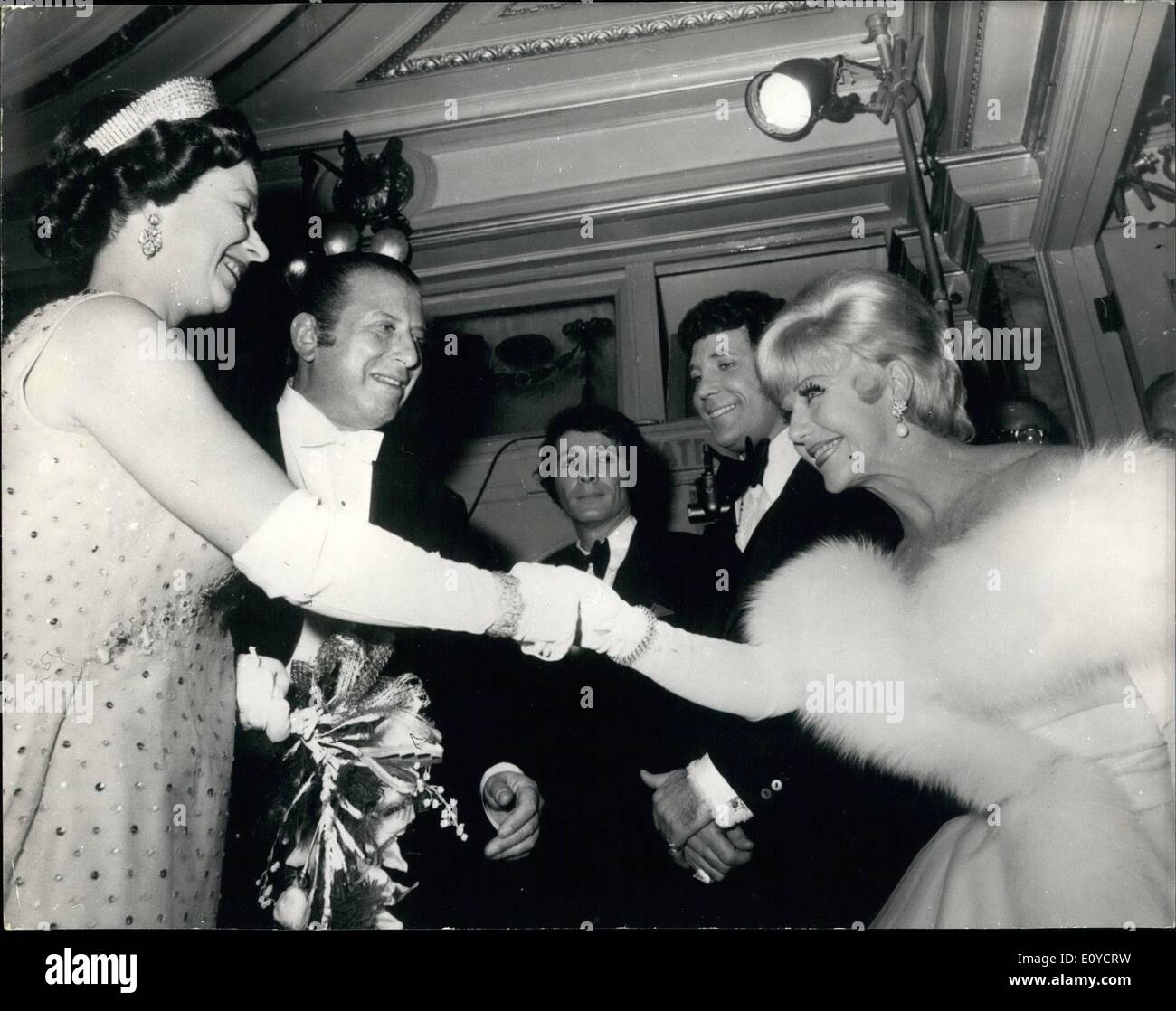 Nov. 11, 1969 - The Royal Variety performance at the London Palladium; The Queen, accompanied by Prince Philip and Princess Anne, last night attended the Royal Variety Performance at the London Palladium. Photo Shows The Queen is introduced to Ginger Rogers star of ''Mame'' when she met the stars of last night's show. Stock Photo