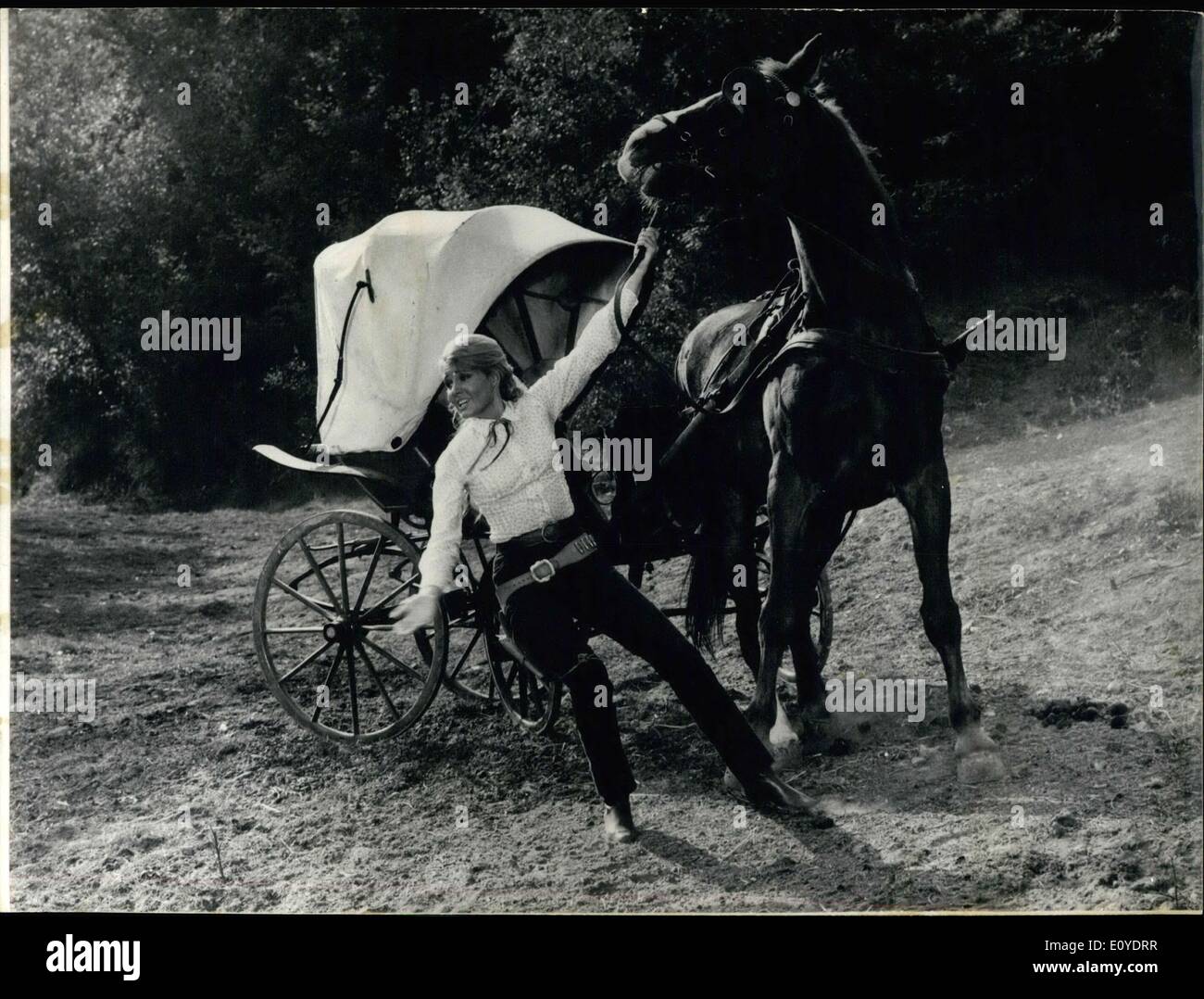 Dec. 20, 1969 - The movie was being directed by Jean Girault. The horse, who had a role in the movie, was spooked during filming and Girault have to calm him down. Stock Photo