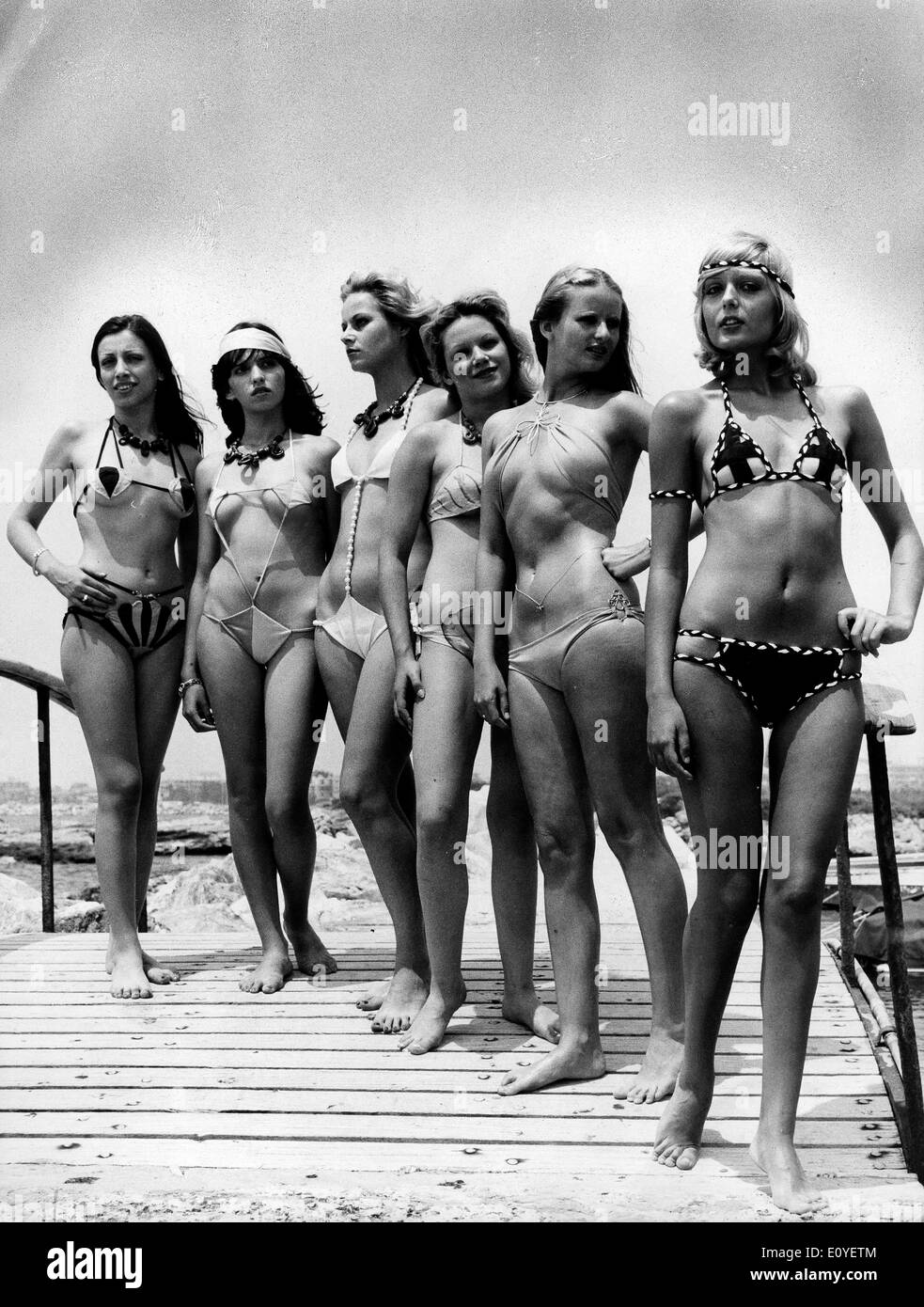 Jan. 01, 1970 - London, England, United Kingdom - File Photo circa:  1960s-1970s. Girls posing in bikini's in fashion shows, shoots and on  beaches tanning. According to the official version, the modern