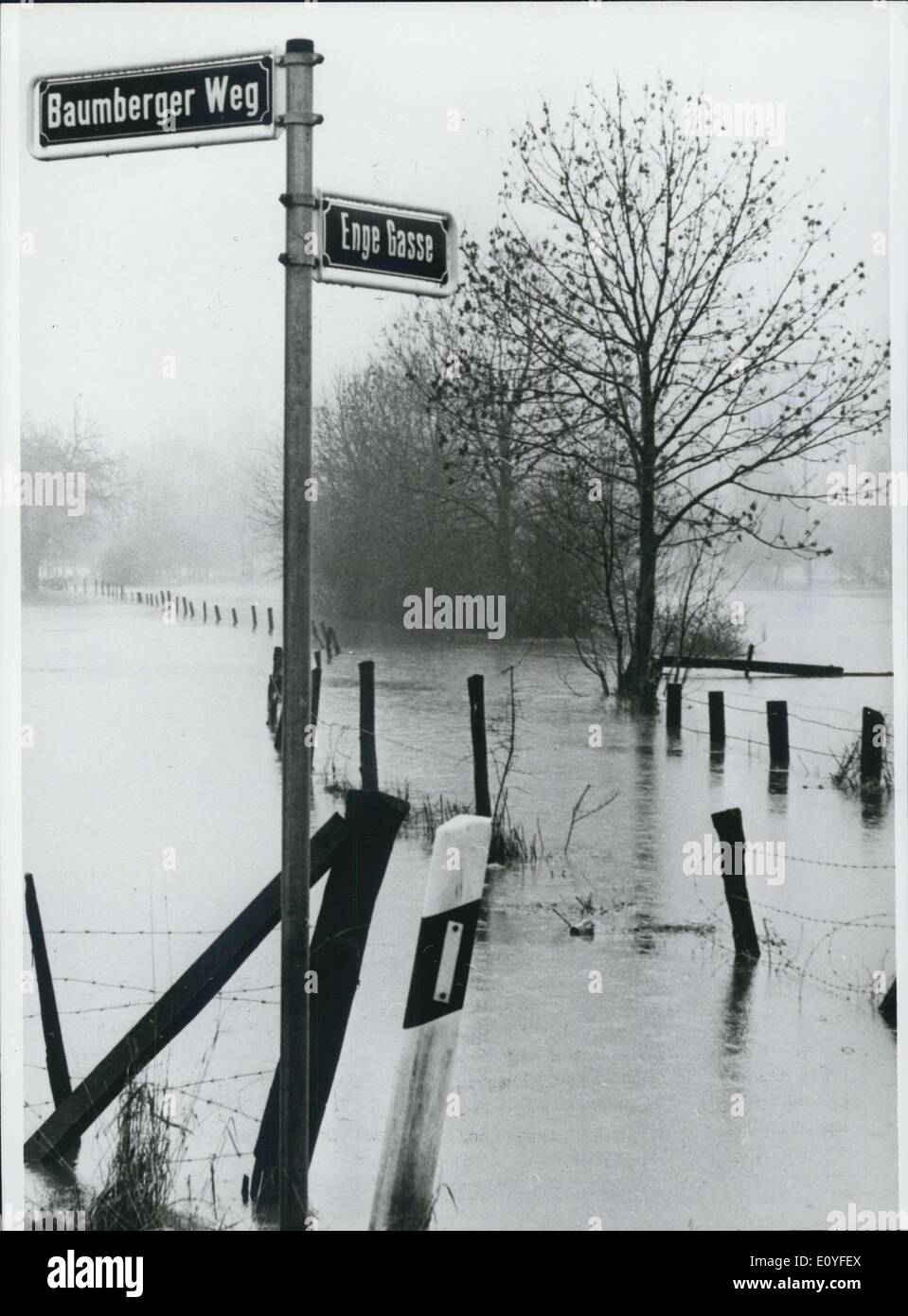 Jan. 1, 1970 - The water level of the river Rhine near the eight - metres - mark: The strong rainfalls and the unusual thaw caused that the river Rhine overflow it's banks. Near the city of Bonn/West Germany the water level reached the 7,50 metres mark. Long parts of the quays must be closed. Some streets are totally overflown. All carferries between Duesseldorf/West Germany and Cologne / West Germany are closed. The traffic have to diverted. In the plant in which the West Germany members of Parliament have their offices the entries have to make waterproof Stock Photo