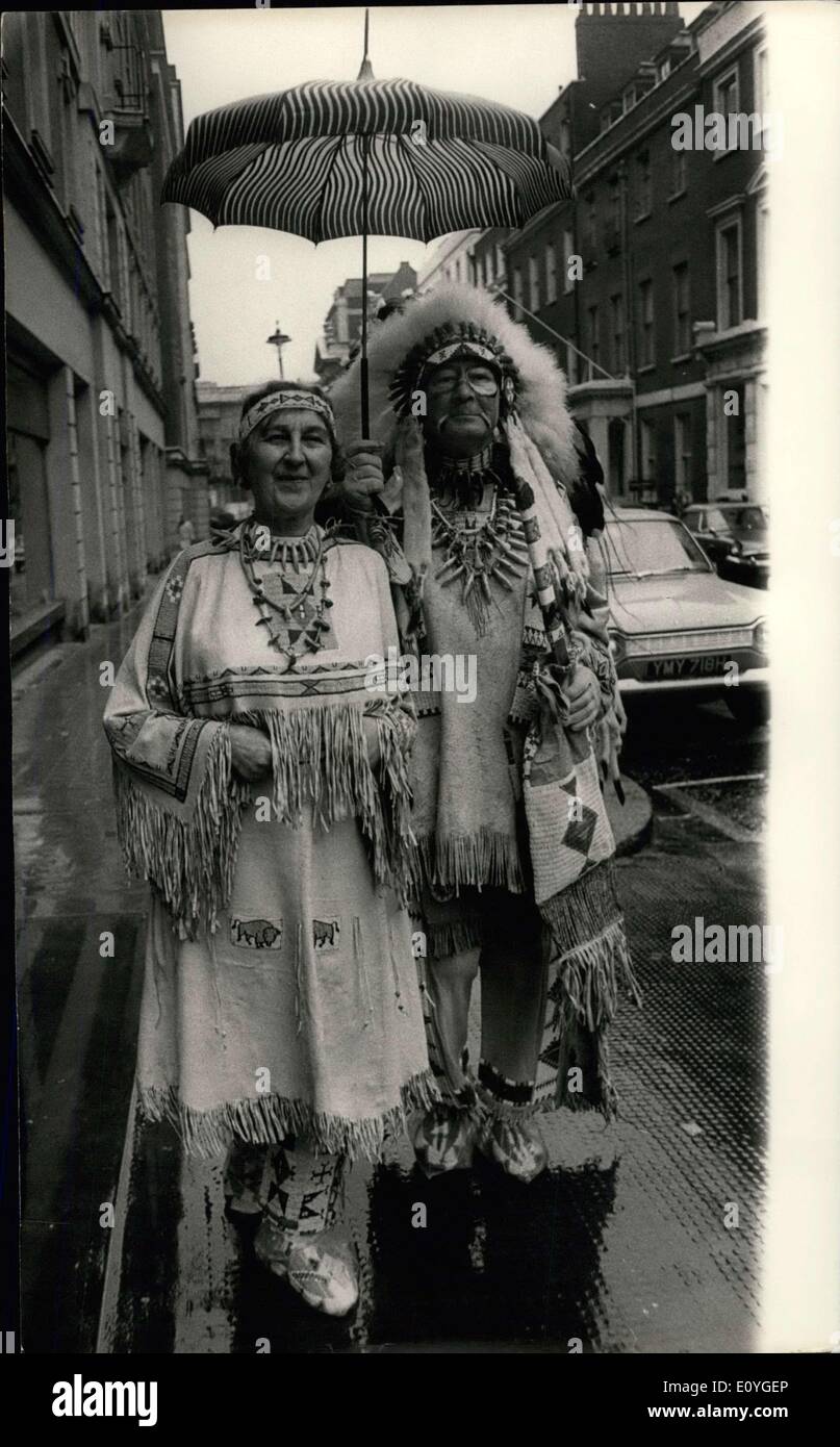 Apr. 06, 1970 - No reservation required.: One of Britain's leading experts on Red Indian folklore and culture, Ed. Blackmore - appeared in full Indian regalia at the U.S. travel Service, Sackville St., W.L., to help present prizes to the lucky winners of a six-day holiday in an American Indian reservation. Ed. Blackmore and his wife, (also in full Indian costume) pointed out some of the more exciting aspects of India culture, and advised the competition winners on how they should spend their holiday. The competition, organised by Radiation Parkray Ltd Stock Photo