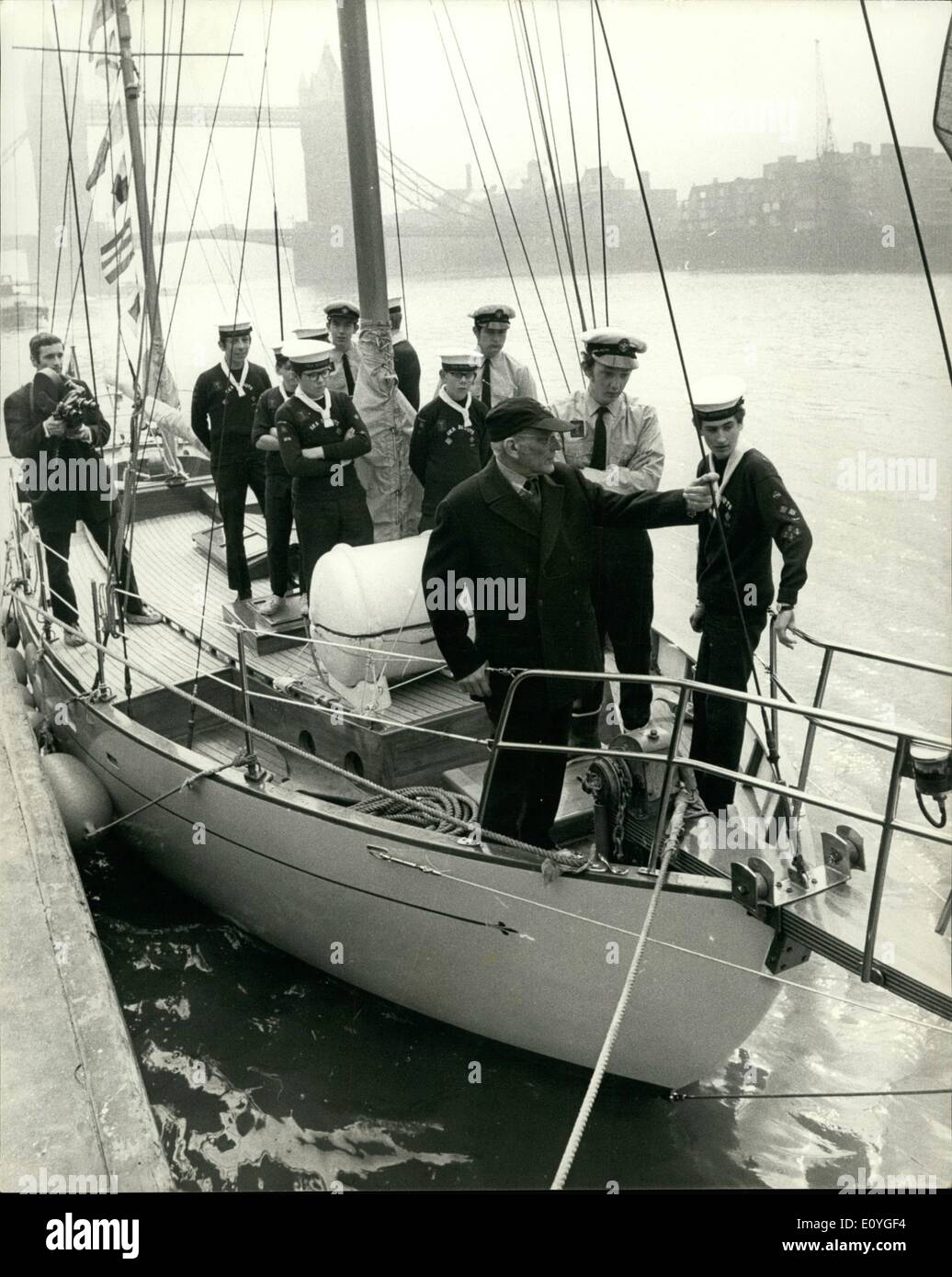 Apr. 10, 1970 - April 10th, 1970 Sir Francis Chichester aboard the Seven Kings. Sir Francis Chichester, the yachtsman, aboard the Seven Kings, an &pound;18,000, 44&frac12; ft. ketch, with boys of the 4th Seven Kings Sea Scouts who helped build her, at Tower Pier yesterday. It took 7 years to build the 16-ton, 8-berth ocean going yacht in a field near the home of the troop's scoutmaster, Mr. Derek Williams, 37, a Woodford, Essex, schoolmaster. Stock Photo