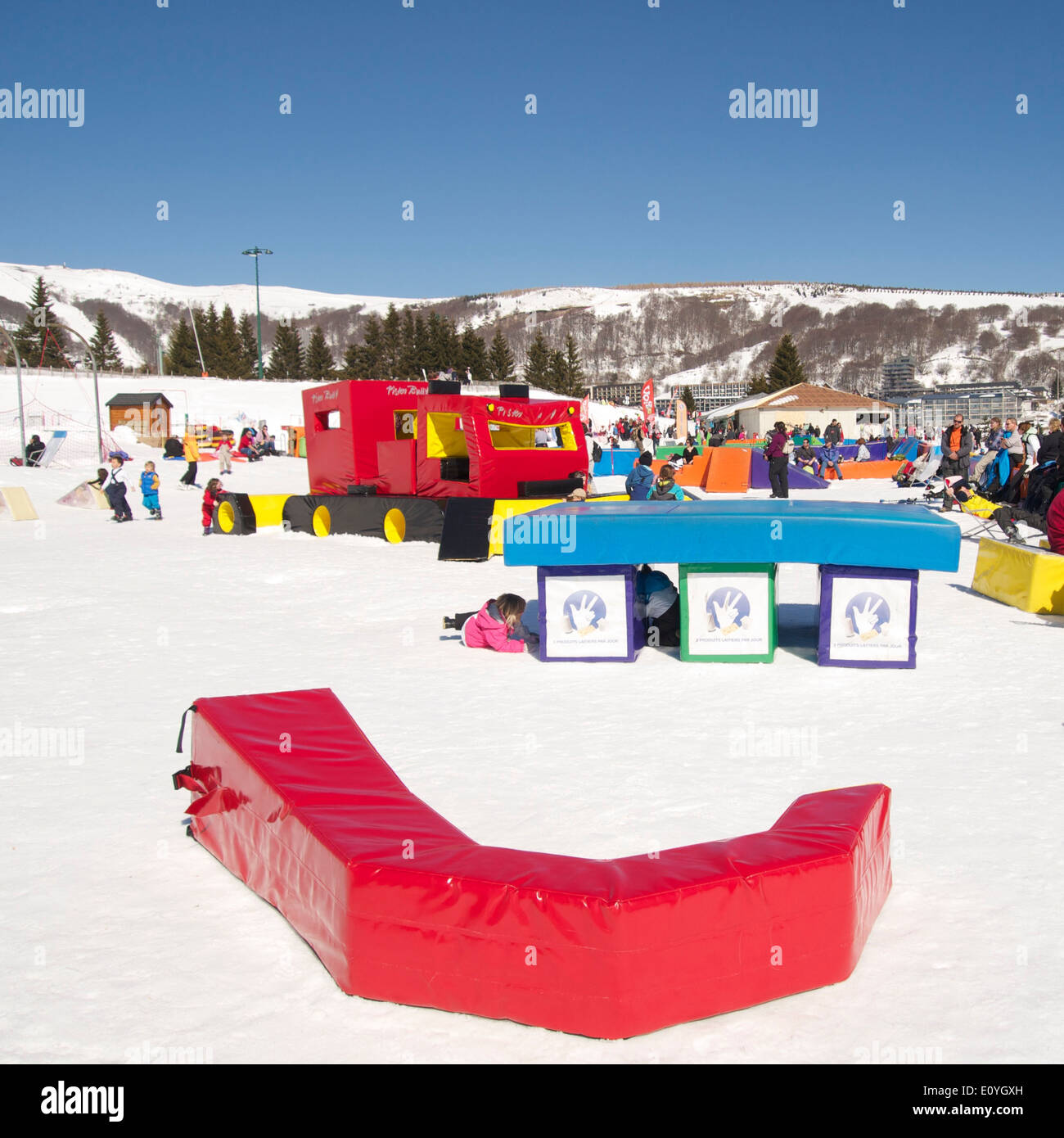 Ski school at Super Besse ski resort, Auvergne, France - with playground equipment Stock Photo