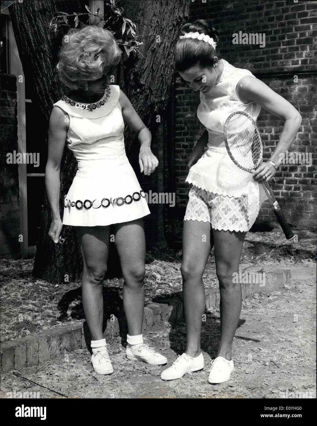 Jun. 06, 1970 - International Tennis stars model Teddy Tinlyng's New 1970 tennis designs.: Several international tennis stars were present at the Belvedore Restaurant in Holland Park. London, today, to model new tennis styles specially created by Teddy Training.: Photo shows Lea Pericoli, of Italy (left) is wearing a flaring shift-dress of 'Dacron' polyester with a fince pleated trim, with gold and pearl decorations, with Carol Ealogeropoulos, of Greece, wearing a see-through midi-dress covering a lace half-slip and bra and silver ''Dacron'' guipure shorts Stock Photo