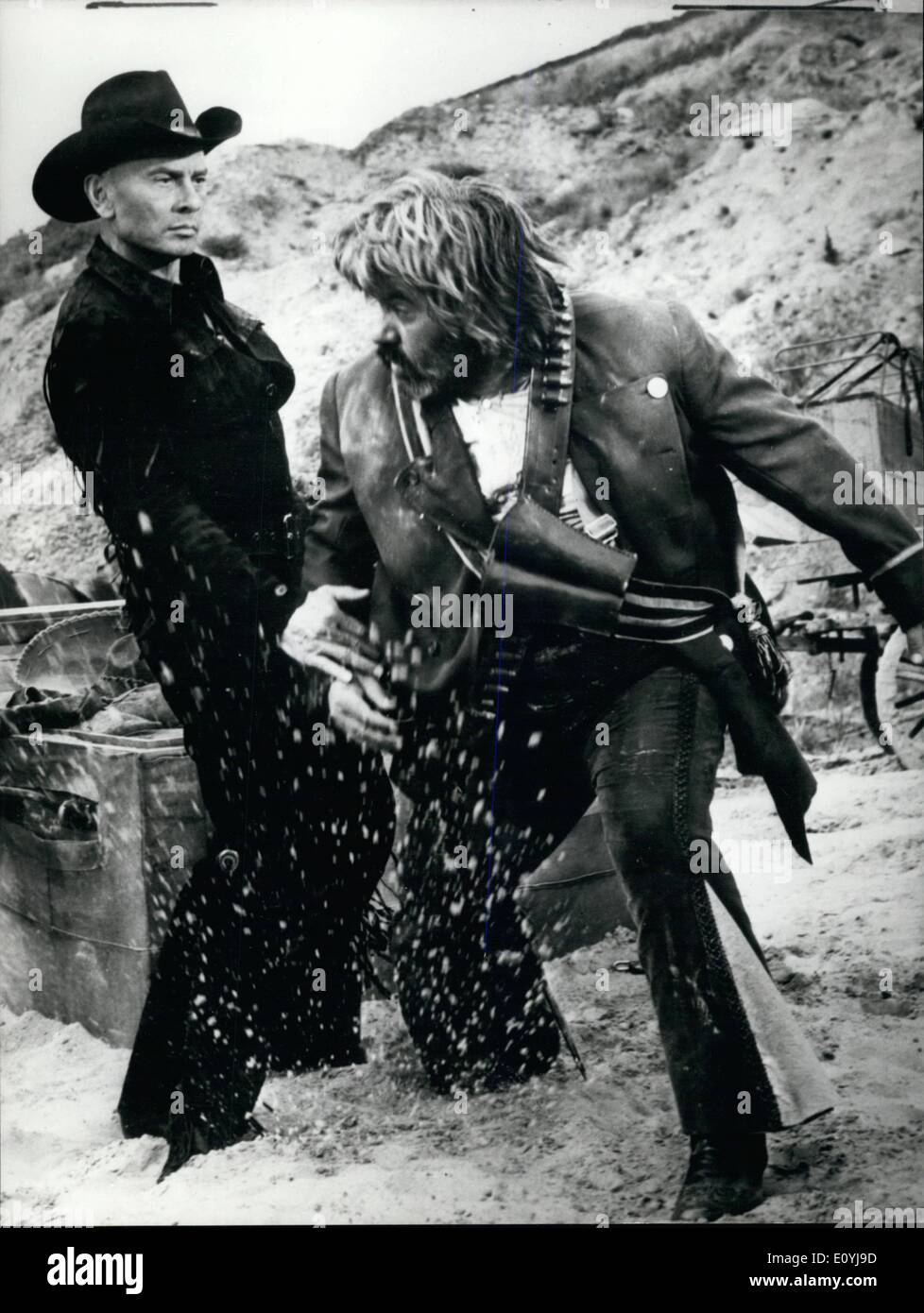 Jul. 07, 1970 - It is working ''Indio Black'', a new western Italian film at Cinecitta, Rome, with Yul Brinner as exceptional actor. The film counts the story of three outlaws and a good heap of gold and is placed in the time of the struggle between Benito Juarez and the Emperor Maximilian. Photo Shows: Yul Brinner and Pedro Sanchez. Stock Photo