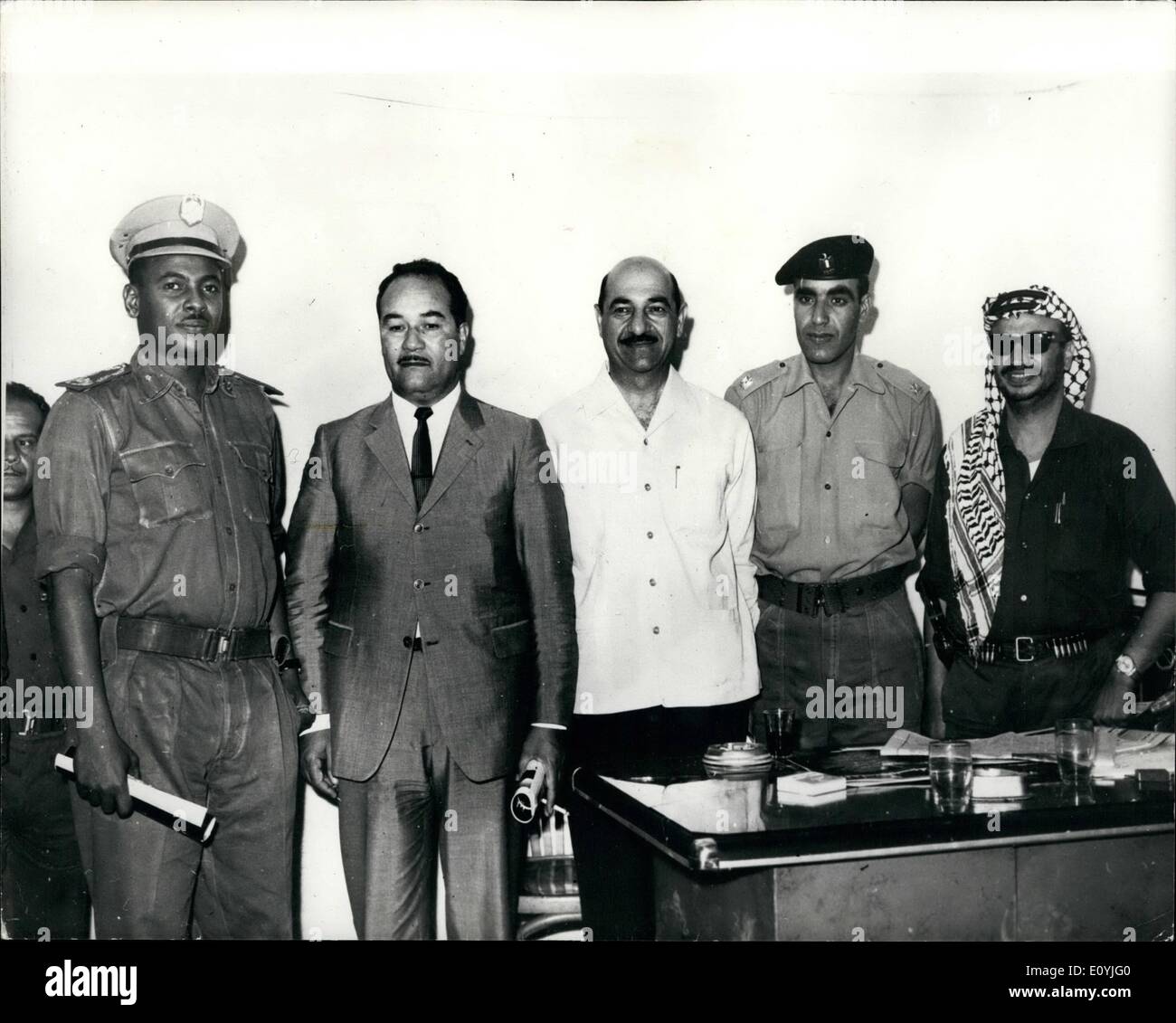 Jul. 07, 1970 - Arafat holds meeting with 4-members of the Arab Mediating Committee: Yasser Arafat, Chairman of the Executive committee of the Palestine Liberation Organization, pictured in Amman last week during a meeting in his office with 49- members of the Arab mediating committee. Seen on the right side of Yasser Arafat, the Libyan, UAR, Algerian and Sudanese delegation. Stock Photo