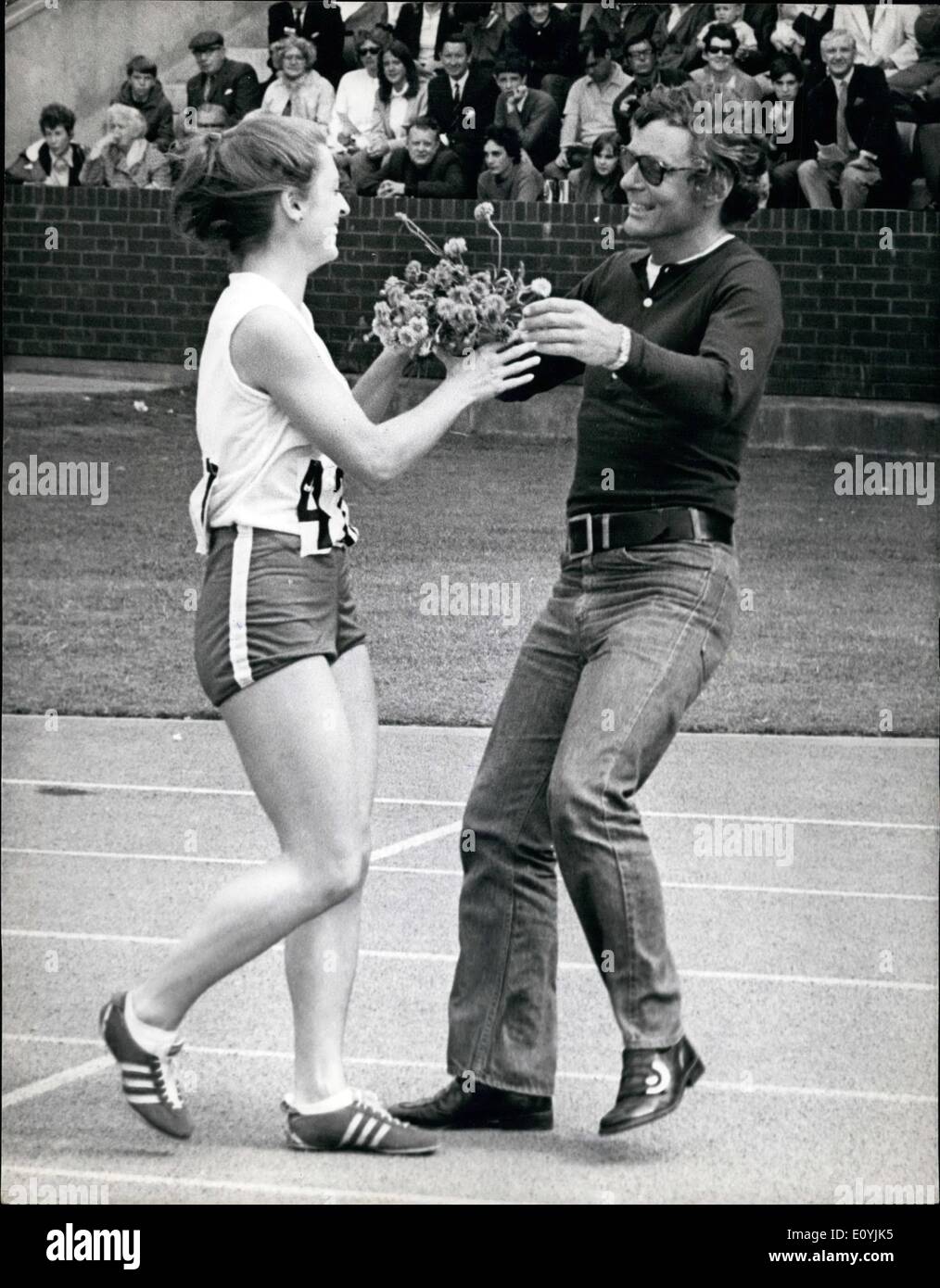 Jul. 07, 1970 - The Commonwealth Games In Edinburgh. Photo Shows:- S. Berto anada) is presented with a bouquet of flowers by J Stock Photo