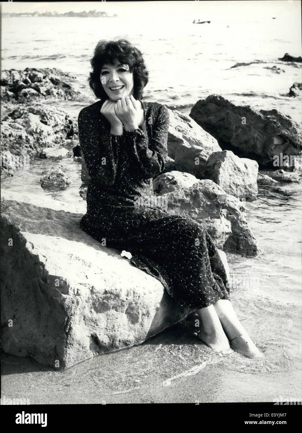 Jul. 11, 1970 - Juliette Greco is seen here wearing a long dress with her newly cut hair as she relaxes at Palm Beach. Stock Photo