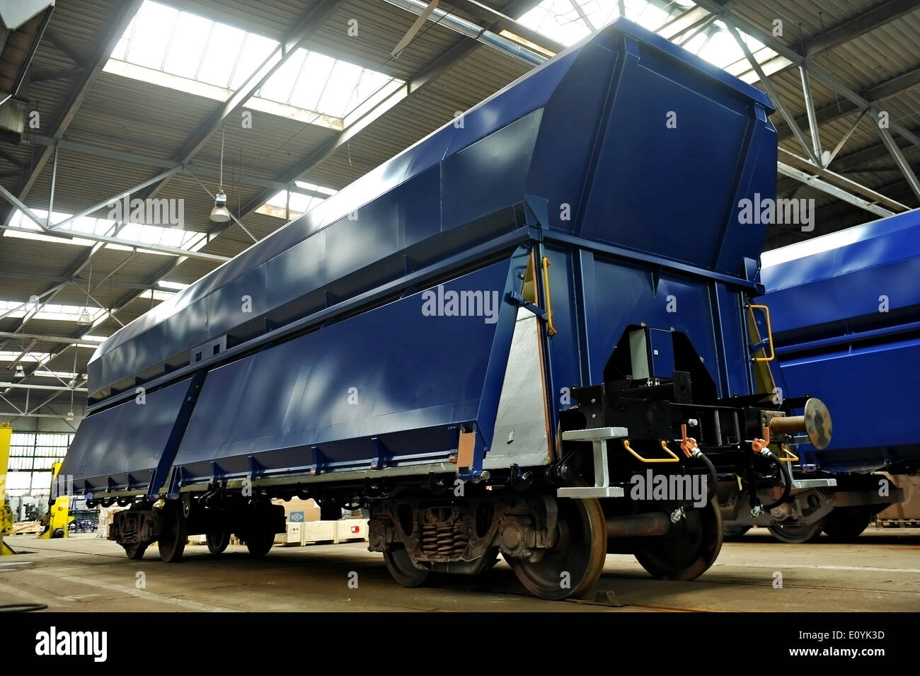 Industry detail with a freight wagon on the factory production line Stock Photo