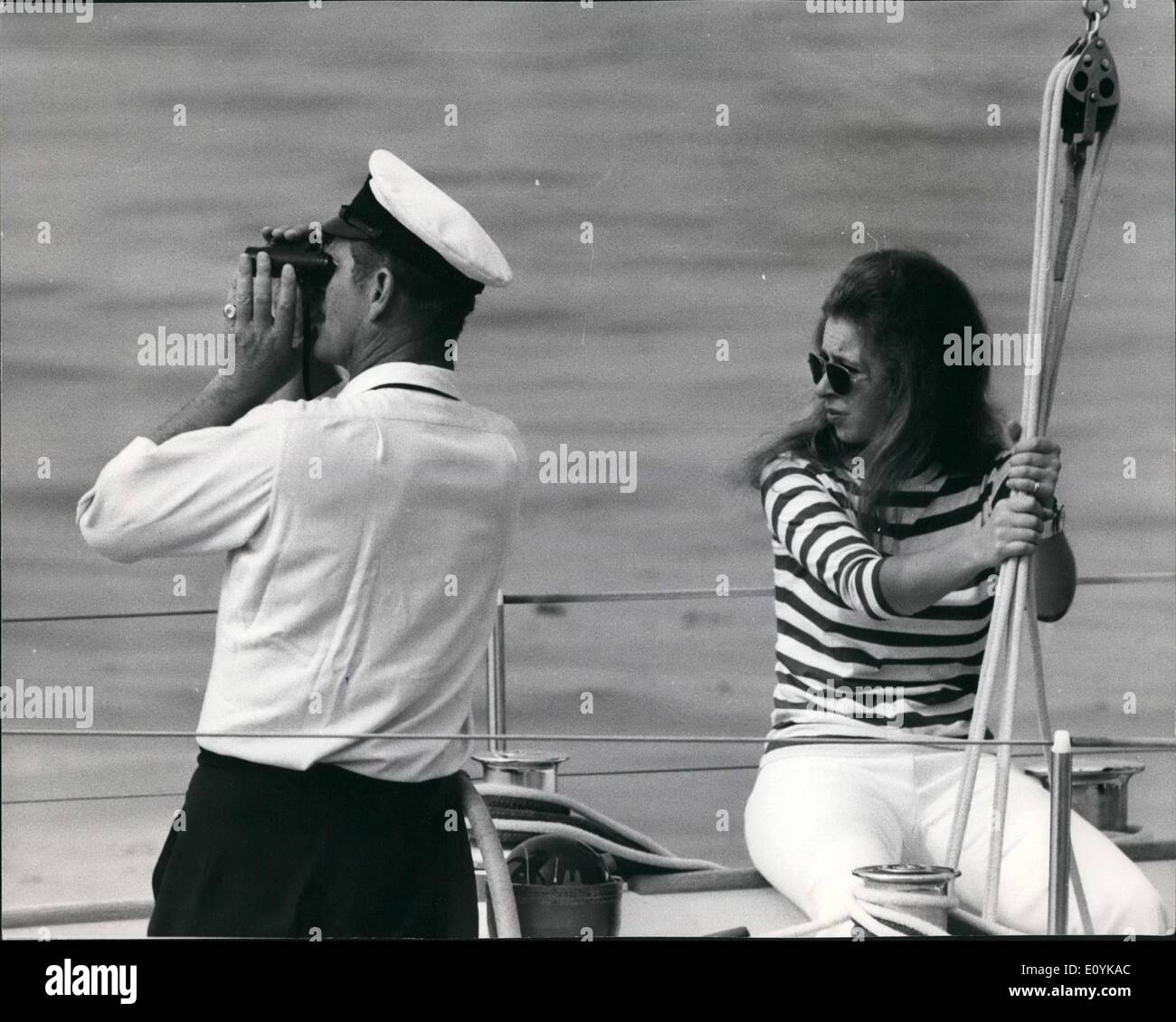 Aug. 08, 1970 - Royals at Cowes. OPS: Wearing a red and white striped T-Shirt, Princess Anne and Prince Philip are seen abroad Mr. Owen Aisher's sloep Yesman XVI. They crewed the yacht in the Britannia Cup today- one of the major events of Cowes week. Stock Photo