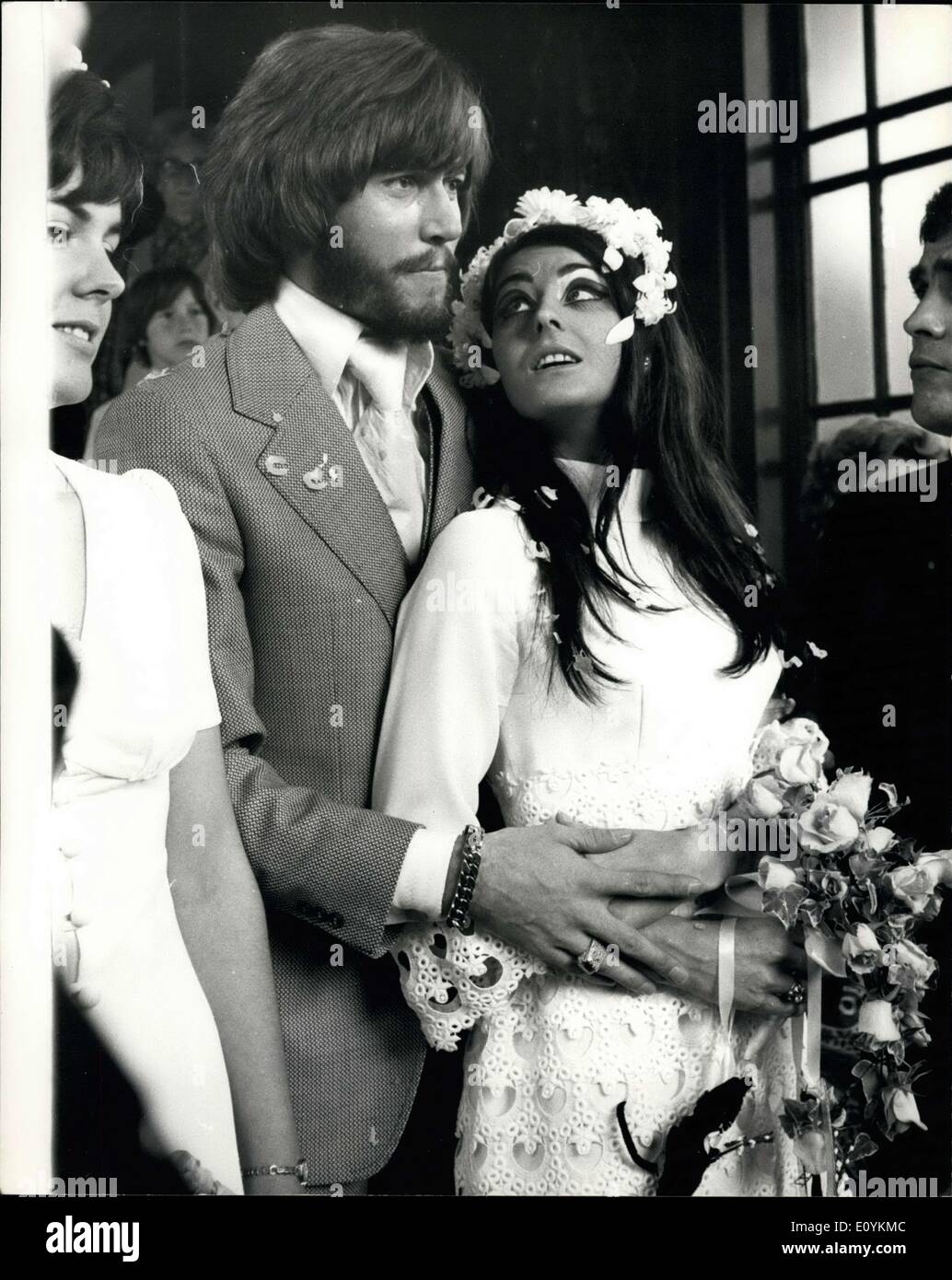 Sep. 01, 1970 - Bee Gee Barry Gibb Weds. Bee Gees lead singer and founder Barry Gibb was married at Caxton Hall today - his birthday - to 20-year-old Linda Gray, a former ''Miss Edinburgh''. Barry founded the group with his two brothers Robin and Maurice. They broke up last December and announced just over a week ago that they were reforming. Barry's previous marriage was dissolved last year. photo shows The happy couple pictured after the ceremony today. Stock Photo