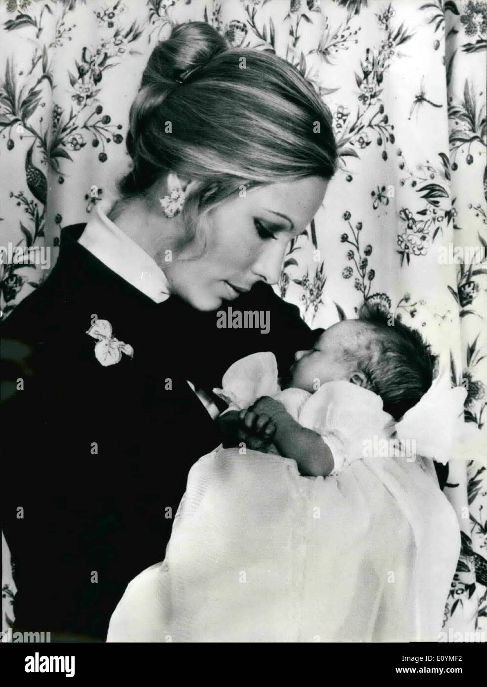 Oct. 10, 1970 - ''Only' a girl The disappointment of Aga Khan and 30 millions of believers ismaelits was very deep after the birth of a baby, who was not the 50th Imam, but ''only'' a girl. Zahra was born the 18 September of this year in Geneva, and the preparations to this birth may be called the much expensive of the world. O.P.S.: Karim Aga Khan (L) and Begum Salima with her baby. The pictures of Zahra have been hold back more than a month after the birth. Stock Photo