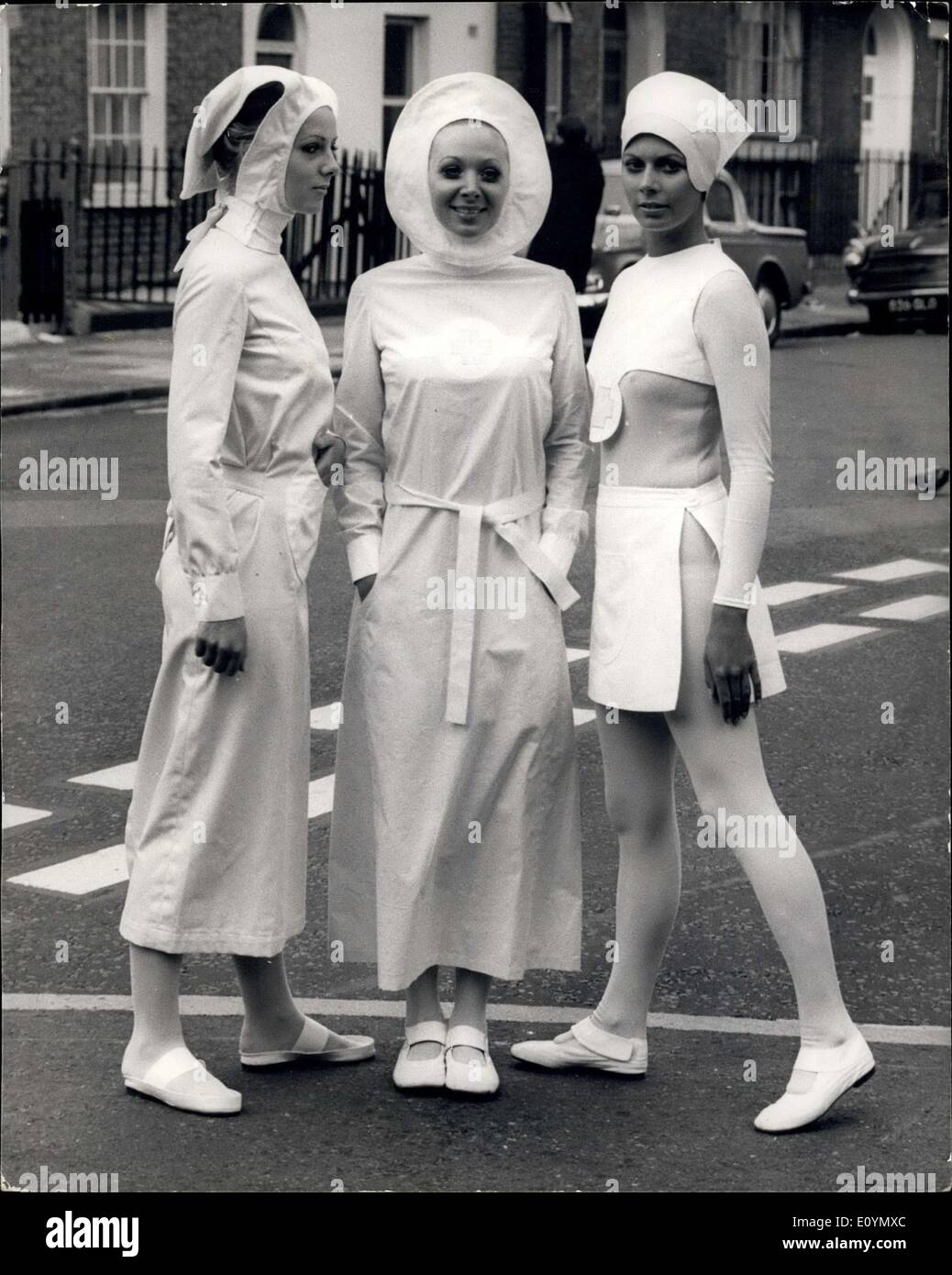 Oct. 25, 1970 - Pierre Cardin's New Uniforms for Nurses shows at Today's Preview of the London Nursing Exhibition.: Revolutionary designs for new uniforms for nurses by Pierre Cardin, were shown at today's press preview of the London Nursing Exhibition, which opens at Seymour Hall, London, W.1. tomorrow The use of colours is a deliberate move by Cardin to lighten the uniforms of war uniforms, and the main consideration in every case was the need for freedom and hygiene. Thus the uniforms have been designed to afford maximum movement. Photo shows Stock Photo