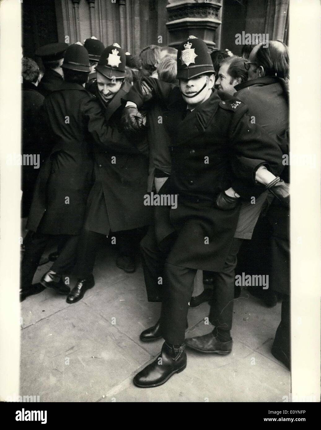 Dec. 08, 1970 - ONE - DAY STRIKERS CLASH WITH POLICE OUTSIDE THE HOUSE OF COMMONS. Thousands of workers took part today in a one-day strike against the Government's Industrial Relation's Bill. After marching from Tower Hill to Speaker's Corner, Hyde Park, they went to the House of Commons to lobby MP's, where several scuffles broke out. PHOTO SHOWS: Police struggle with some of the strikers who tried to force their way into the House of Commons today. Stock Photo