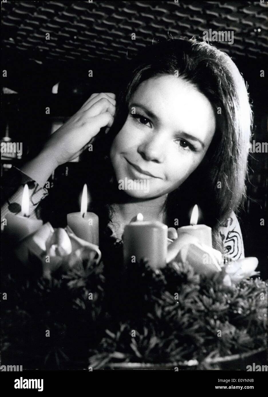 Dec. 15, 1970 - Irish Singer Dana at Munich's ''Christkindlmarkt''. Singer Dana enjoyed her 'shopping walk' at Munich's ''Christkindlmarkt'' like a child. the 20 year old Irish girl, with the song ''All kinds of everything'' winner of the Grand Prix song festival 1970 was not only surprised by all the little things but she also bought many things: many Christmas tree balls and other decorations for the huge Christmas tree in her home town Londonderry, gingerbread and almonds as taste for herself. Dana Brown, accompanied by her father, who is her manager, came to Munich in business matter Stock Photo