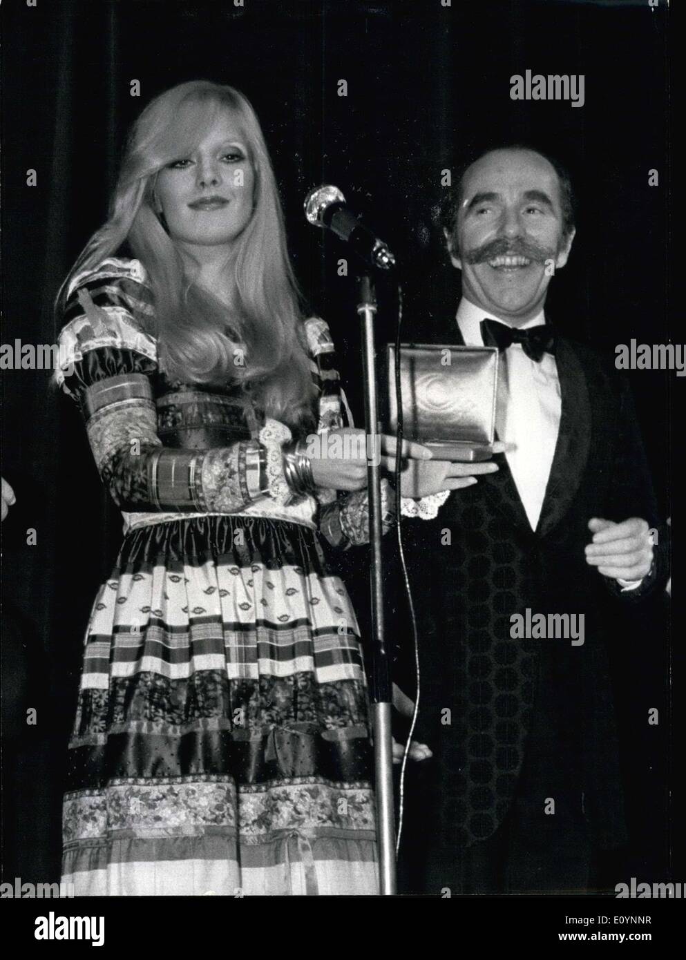 Dec. 18, 1970 - Sylvie Vartan Awarded Cinema ''Triumph'': Sylvia Vartan was one of the winners of the cinema Triumphs, French Cine Oscar Awarded at the Marigny Theatre, Paris, last night. Photo sows Sylv~e Vartan pictured ith her ''Triumph'' on right Jean Paul Rouland, French Comedian. Stock Photo