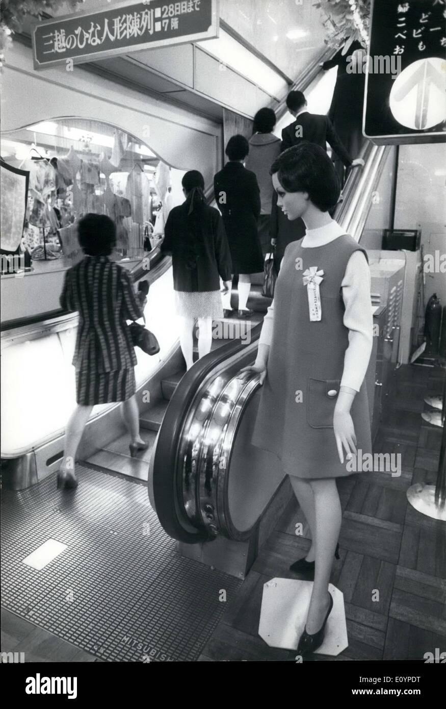 Feb. 02, 1971 - Dummies Replace ''Welcome Girls''. Ever since Tokyo department stores installed escalators, pretty girls in smart uniforms were stationed at the bottom of each flight of stairs whose job was to bow and say ''Irassaimase (welcome) in a happy voice as the shopper stepped on the moving stairs. Due to labour shortage this practice has been discontinued and in any case it was considered a waste of 'Girl Power' as in some stores there were as many as 22 escalators. The ''Welcome Girls'' are being given sales jobs instead Stock Photo