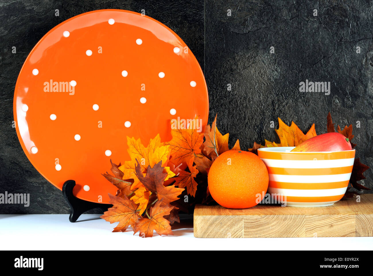 Modern Orange and White Polka Dot Kitchen with large platter plate