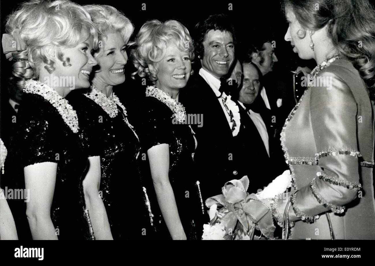Apr. 04, 1971 - Princess Anne attends a gala charity show called ''Fall in the stars'' at the London palladium: Princess Anne was present last evening at a gala charity concert at the London palladium, sponsored by the variety club of great britain, to raise funds for the children's section of the army benevolent fund. the array of stars appearing were drawn from theater, films, television, variety , ballet and all sides of the entertainment world. photo shows Princess Anne meets the Beverley sisters on stage, after last night's charity show. Stock Photo
