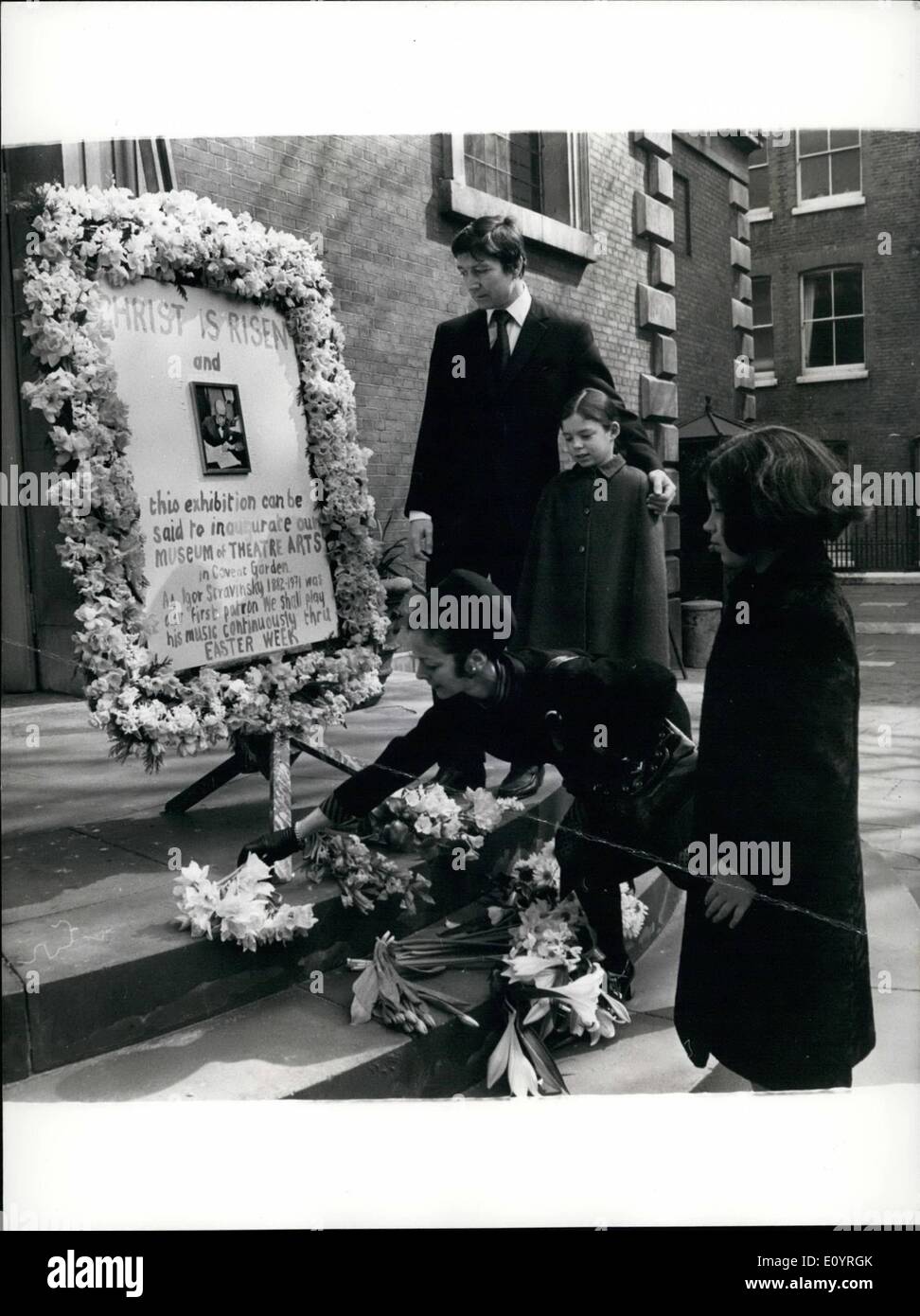 Apr. 04, 1971 - Atribute to the composer Igor Stravinsky photo shows Atribute yesterday to the composer Igor Stravinsky, who died last week at the age of 88)from Mryon Lane, the ballet dancer, outside St. Paul's church, cevent garden, built originally about 1631 by Inigo Jones and in whose churchyard lie the remains of Dr. Thomas Arne, who composed ''Rule Britannia''. looking on is miss lane's husband, the dancer David Blair, and their twin daughters, Catherine and Diana, 13. Stock Photo