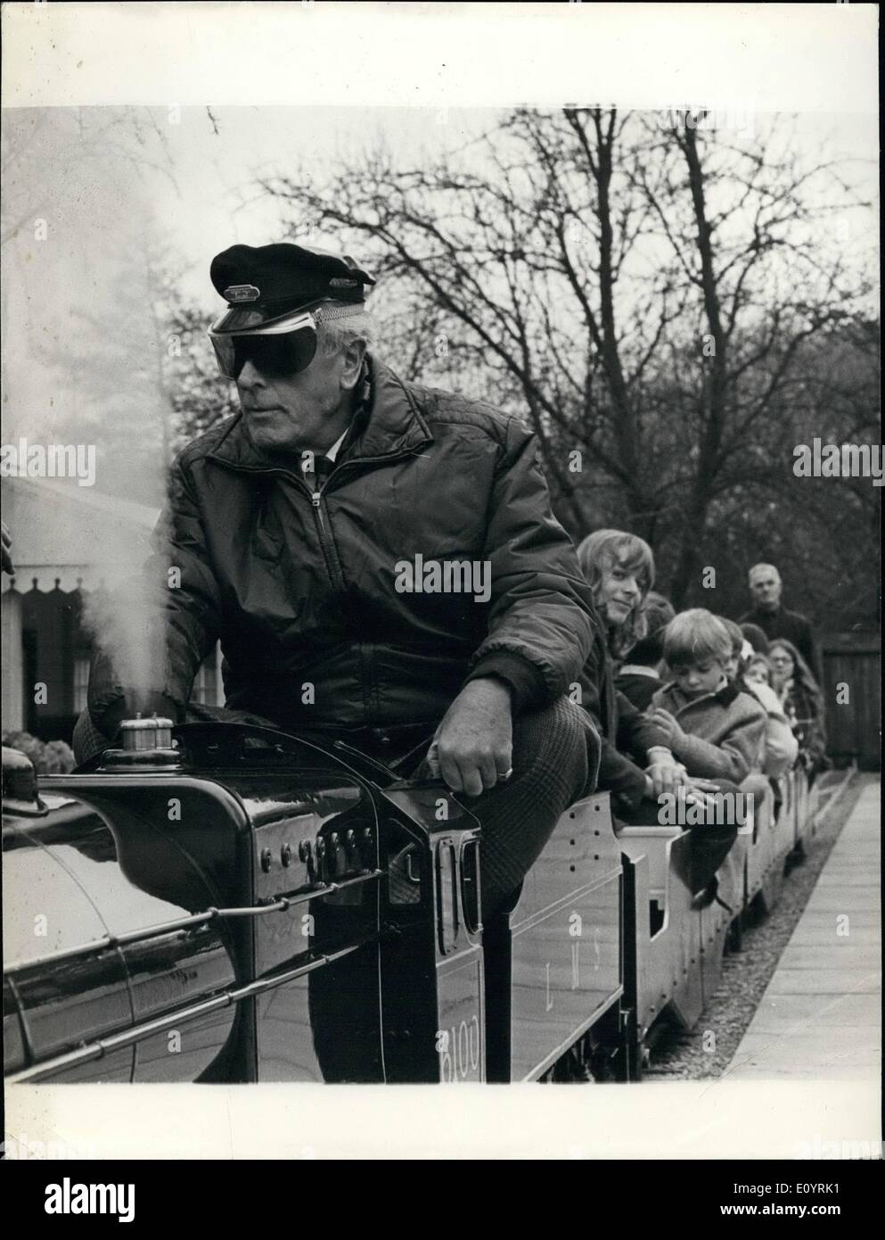 Apr. 04, 1971 - Former First Sea Lord Becomes A Train Driver: Wearing a peaking cap and goggles Earl Mountbatten of Burma realised a childhood ambition to be an engine driver. The former First Sea Lord found himself back at the helm yesterday when he opened a new miniature railway in the grounds of Newby Hall, one of Yorkshire's stately homes. The Earl sat in the driver's seat of the engine a scaled down replica of the Royal Scot when he took a trip on the miniature railway pulling a carriage of excited children Stock Photo