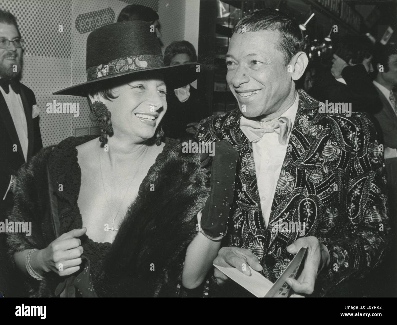 Apr 16, 1971 - Paris, France - HENRI SALVADOR and his wife JACQUELINE SALVADOR arrive at the premiere of Jerry Lewis performance at the Olympia Music Hall. Stock Photo