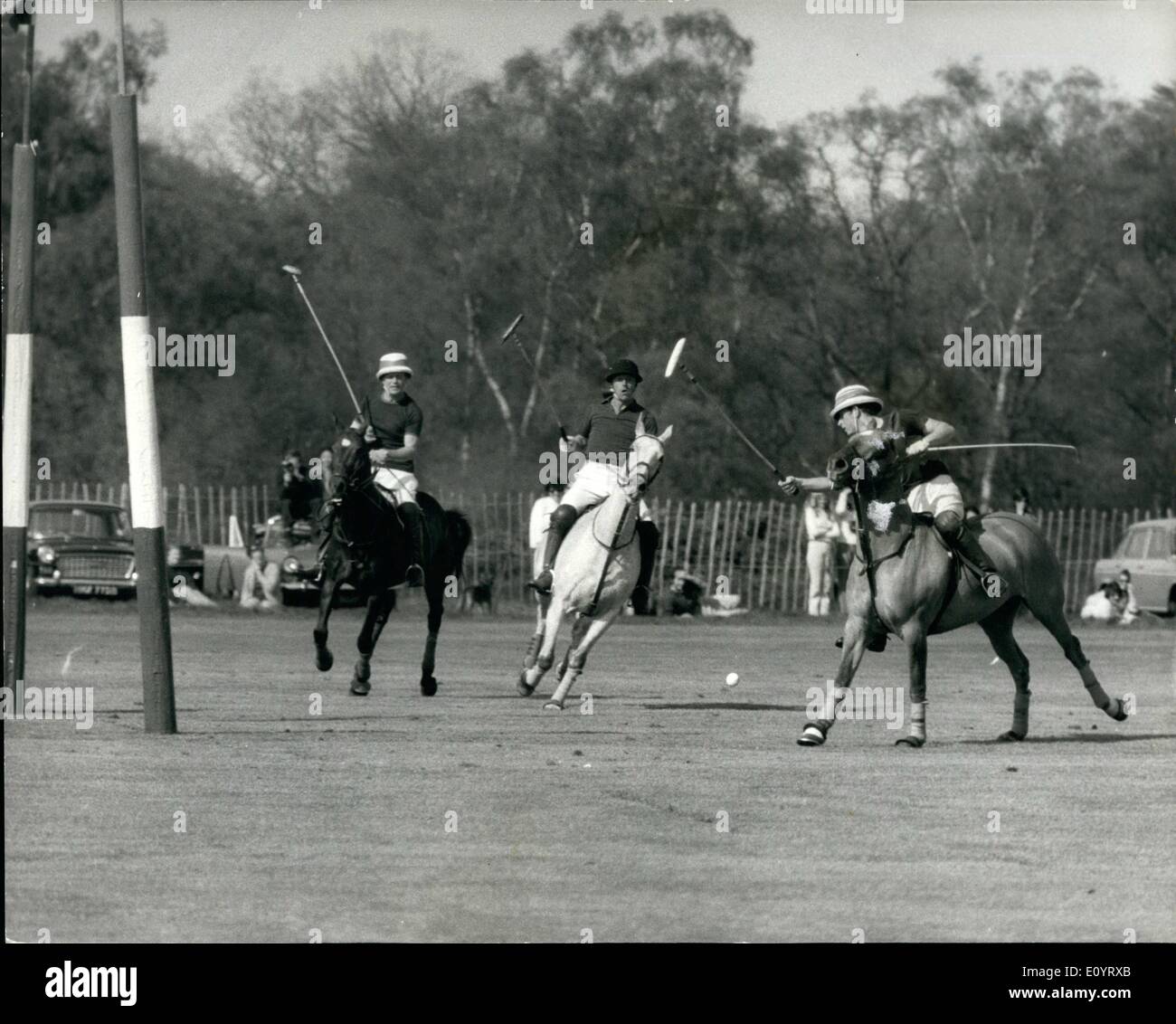 May 03, 1971 - May 3rd, 1971 Father and son are polo rivals. A scoring shot from the Prince of Wales who scored four goals for Friar Park at Windsor yesterday, against Windsor Park, whose team included his father, Prince Philip, and Prince William of Gloucester. Friar Park won 8-3&frac34; Stock Photo