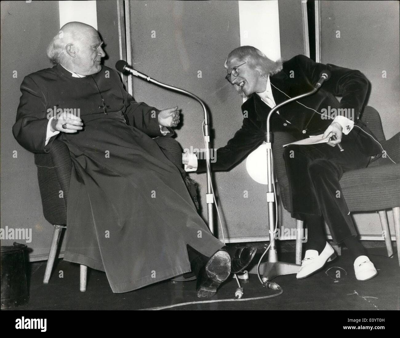 May 05, 1971 - Dr. Ramsey. Photo shows The Archbishop and Jimmy Saville seen enjoying a joke during the recording of the Speak Easy Programme last night. Stock Photo