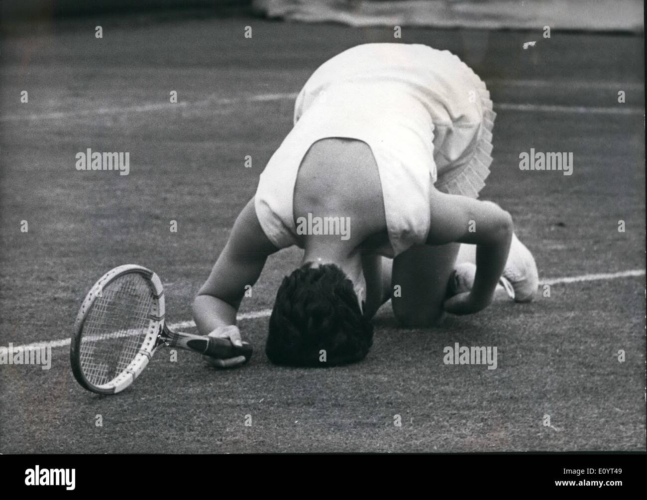May 05, 1971 - Australian Girl Wins the Women's Singles Final of the Rothman's Surrey Lawn Tennis Championships: Judy Dalton, of Australia, won the Women's singles final of the Rothman's Surrey Lawn Tennis Championships at Surbiton today when she beat Joyce Williams, the British No.4, 9-8, 6-2. Photo shows Joyce Williams buries her head on the court after missing a volley. Stock Photo