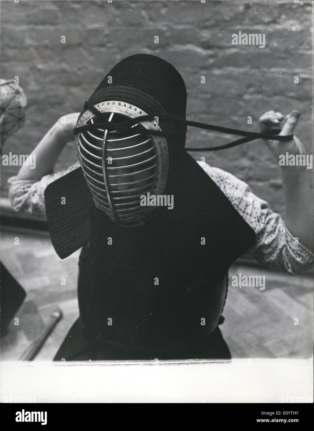 Jun. 06, 1971 - Girls Learn Kendo too-and here Marina Knibbs, ten,ties on  her helmet before the bouts begin Stock Photo - Alamy