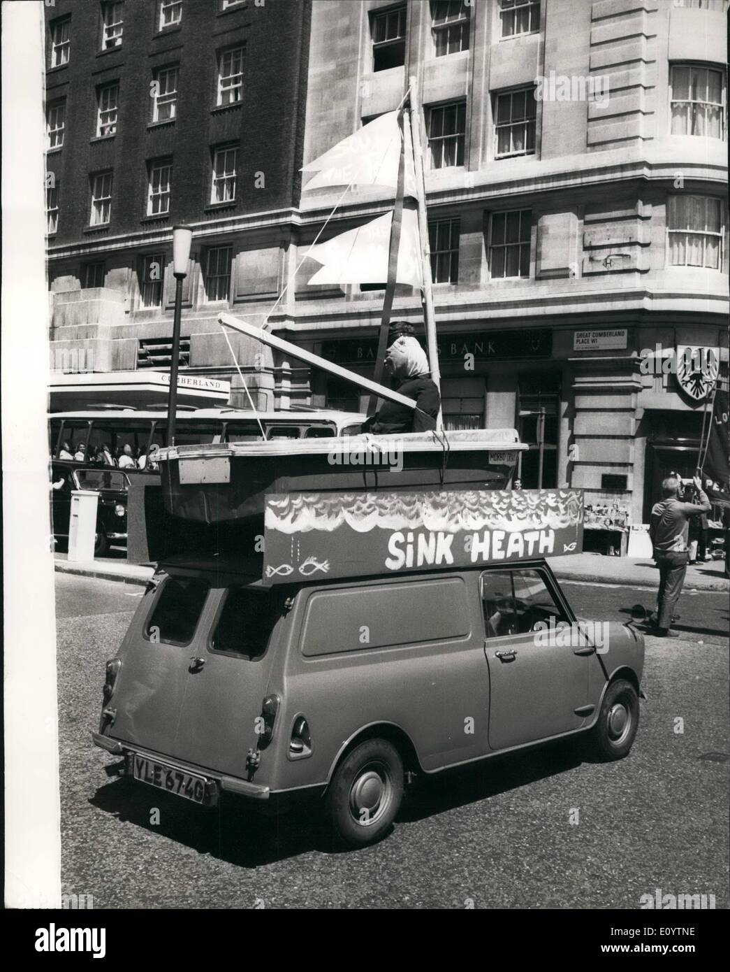 Jun. 06, 1971 - ''Drive the Tories out'' Communist Party demonstration in London: The Communist Party today held a ''Drive the Tories Out'' demonstration when they marched from Hyde Park to Trafalgar Square where they listened to speakers. Photo shows an effigy of the Prime Minister in a yacht with the words ''sink Heath'' which took part in the march from Hyde Park to Trafalgar Square today. Stock Photo