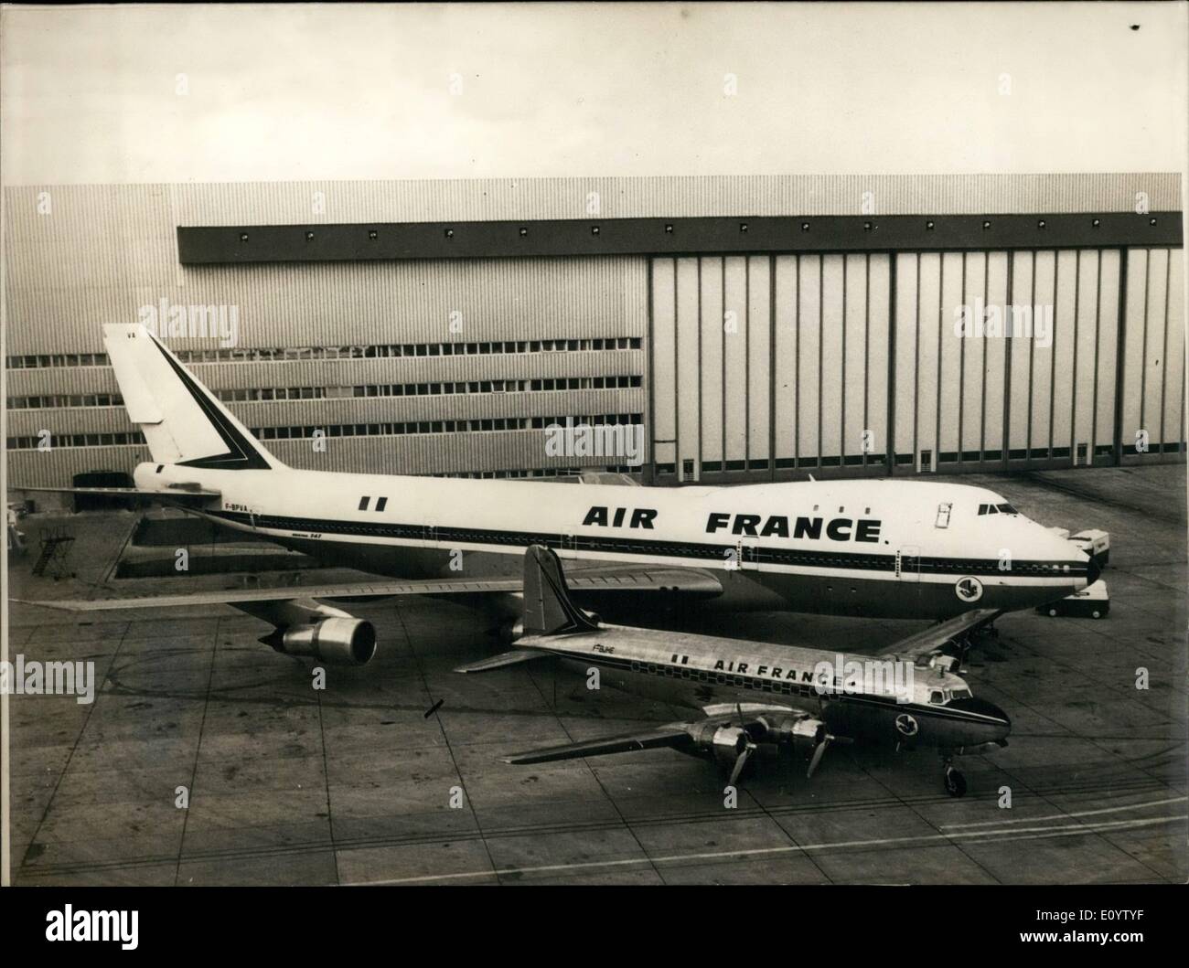 Jun. 06, 1971 - The Giants and the Dwarf: Twenty years of Atlantic Story Between the two aircraft.: A giant Boeing 747 next to a Dwarfed Douglas DC-4 illustrates the progress achieved in commercial aircraft within the last twenty years. The DC-4 made its maiden flight Paris - New York - Paris in 1964. carrying 44 passengers and flying at a cruising speed of 350 kms. The Boeing 747 weighing 330 tons carries 350 passengers at a cruising speed of 950 kms. per hour. Stock Photo