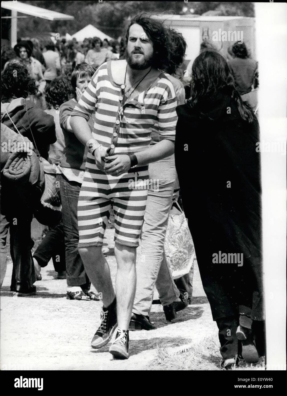 Jun. 27, 1971 - June 27th, 1971 Ã¢â‚¬ËœHippie' Police seize 100 pop fans at a Pop Festival in Reading. Detectives in hippie gear searched hundreds of teenagers for drugs at the Reading Pop Festival yesterday. More than 100 fans were arrested. It was estimated that some 20,000 fans camped out despite the heavy rain. Photo Shows: One of the pop fans dressed in an old fashioned bathing suit at the Pop Festival yesterday. Stock Photo