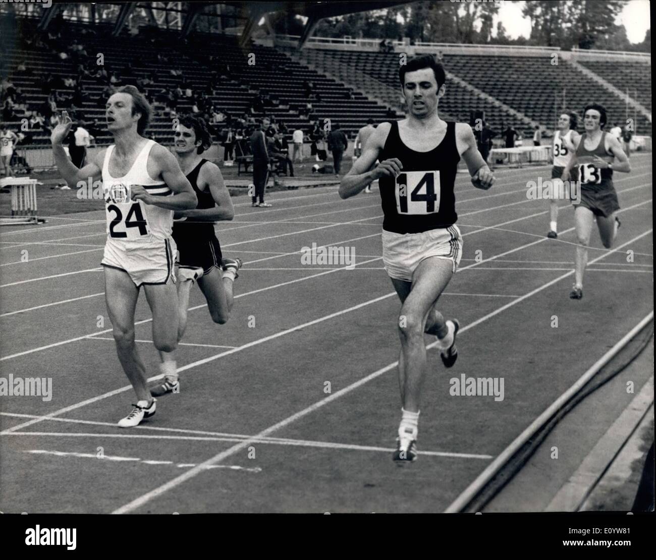Jul. 07, 1971 - Win For Cropper: London: David Cropper of Birchafield Harriers (No 14) breaks the tape fraction before John Greatrex of South London Harriers (No 14) to win Heat 2 of the 800 Metres at the Crystal Palace National Sports Center in South London evening during the A.A.A. Championships. Both Crapper and Greatrix qualified for the final of the event. Cropper's time was 1 minute 53 second..a time equalled by Greatrix. Stock Photo