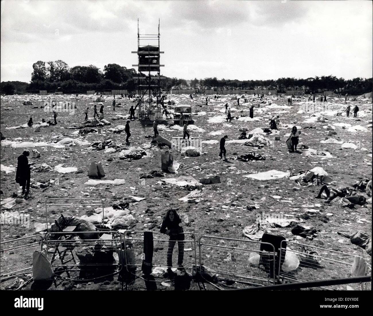 Aug. 31, 1971 - At the end of the Weeley Pop Festival: An estimated 140,000 people flocked to the 200-acre site at the Essex village of Weeley. They left hundreds of tons of rubbish which was being cleared by the organisers, members of Clacton Round Table. Photo shows the vast pop audience has left and the grass can be seen again through the hundreds of tons of rubbish which was being removed yesterday to enable the Essex village of Weeley to return to normal. Stock Photo