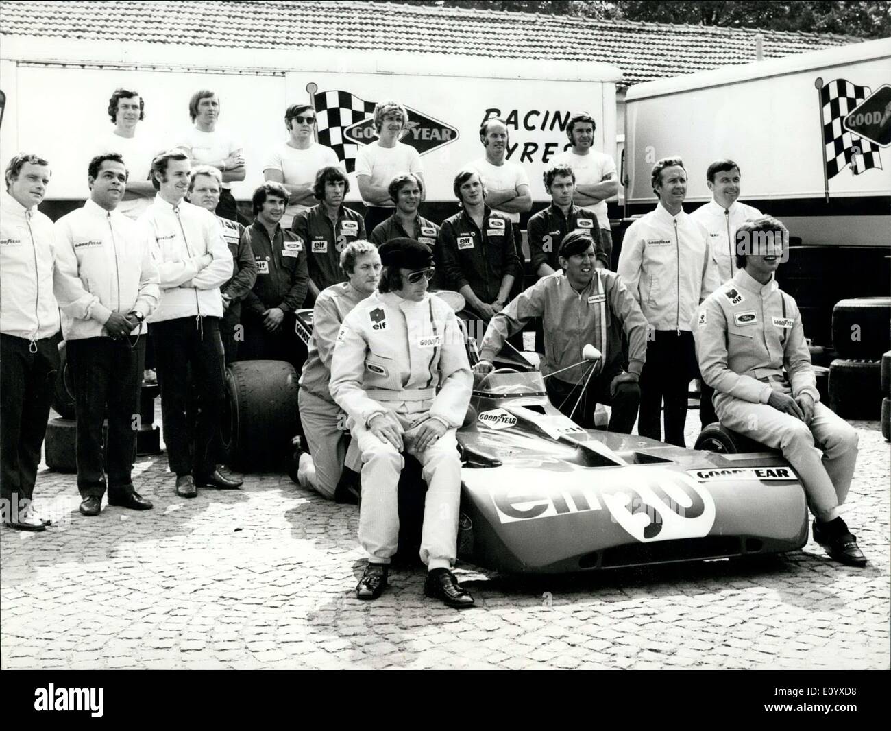 Sep. 17, 1971 - Tyrrell-Ford as world champion. Picture shows left world champion Jackie Stewart, right the driver Francois Cevert between them the constructor of the Car, Mr. Tyrrell and behind the mechanics of the Ford racing team. Stock Photo
