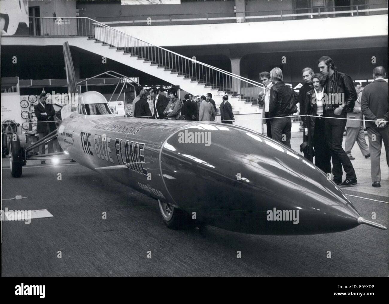 Sep. 21, 1971 - Rocket-Car holding the World record at the ''Auto-Mechanika 71'' in Frankfurt:The fastest vehicle on land in the world..is the rocket-car called ''Blue Flame'', which reached the unbelievable speed of 1001,667 km/h on the Big Salt Lake in the USA on 23rd October, 1970.(The driver holding this world record is the American Gary Gabelich).The motor of the rocket makes 58000 HP, the 39 ft long vehicle is 6614 Ibs heavy.The super-car can be seen for the first time in Europe, it has been brought to Frankfurt by a special transport plane Stock Photo