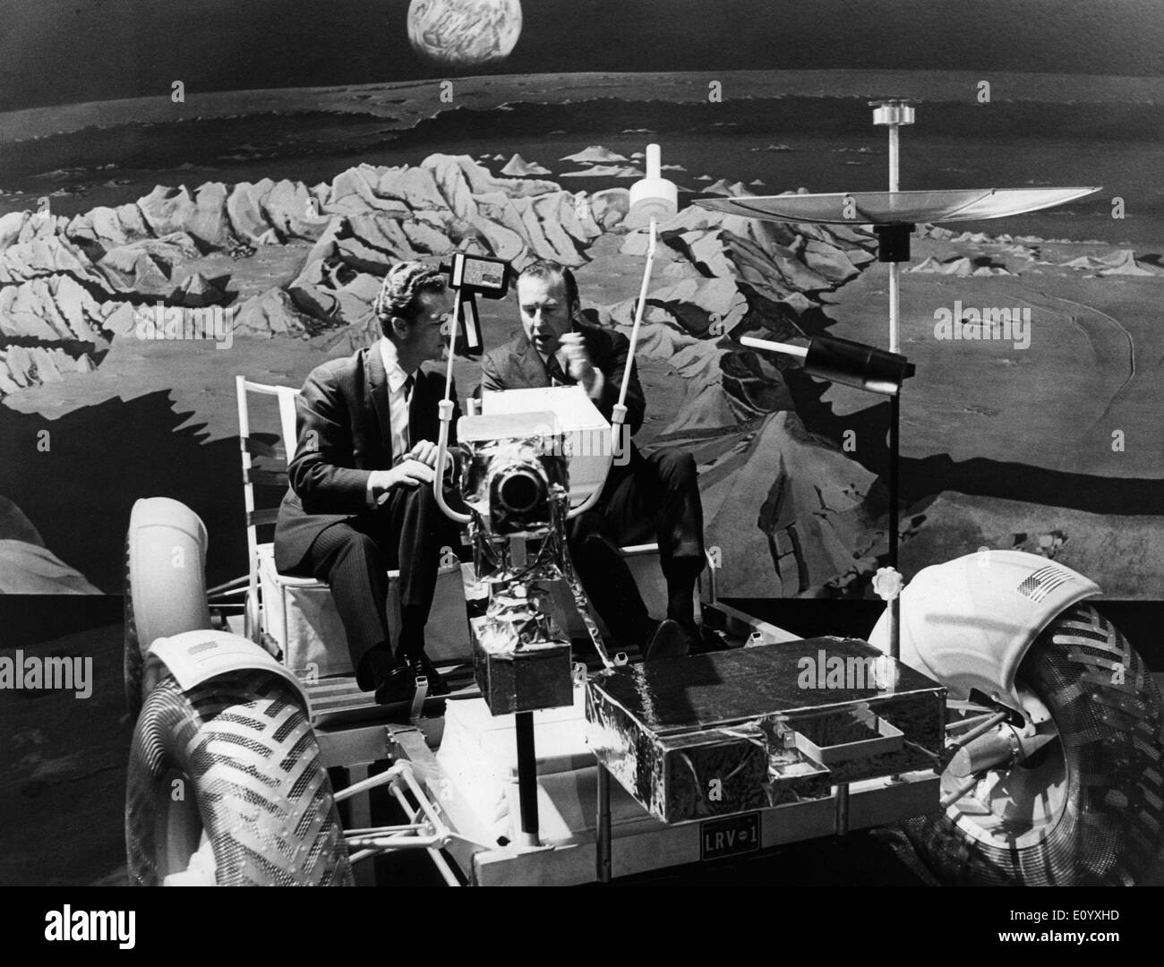 Astronauts on Lunar moon car Stock Photo