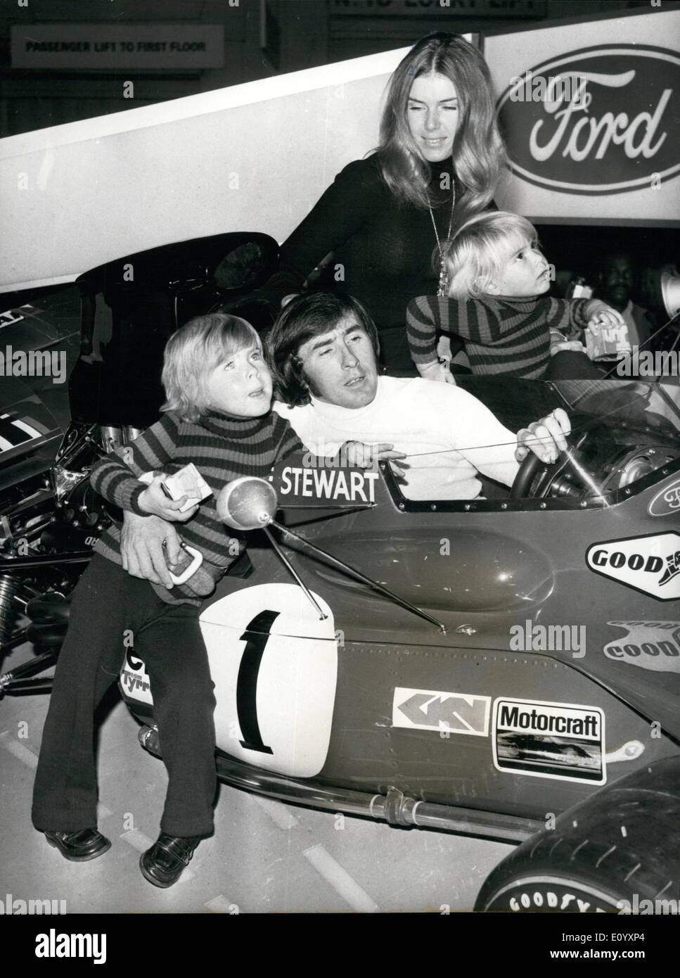 Oct. 10, 1971 - Opening of the Motor Show; The 1971 Motor Show was opened today at Earls Court by Princess Alexandra. Photo Shows Jackie Stewart, the world champion racing driver, with his wife Helen and sons Paul (eldest0 and Mark, pictured with his championship winning Tyrrell Ford car at the show. Stock Photo