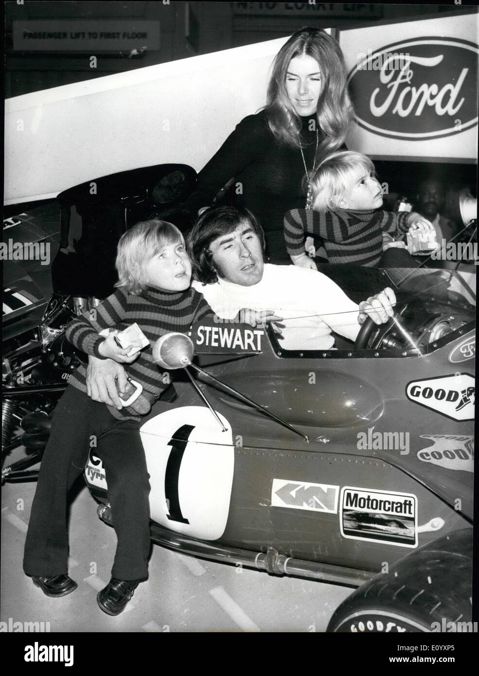Oct. 10, 1971 - Opening of the Motor Show; The 1971 Motor Show was opened today at Earls Court by Princess Alexandra Photo Shows Jackie Stewart, the world champion racing driver, with his wife Helen and sons Paul (eldest) and Mark, pictured with his championship winning Tyrrell Ford car at the show. Stock Photo