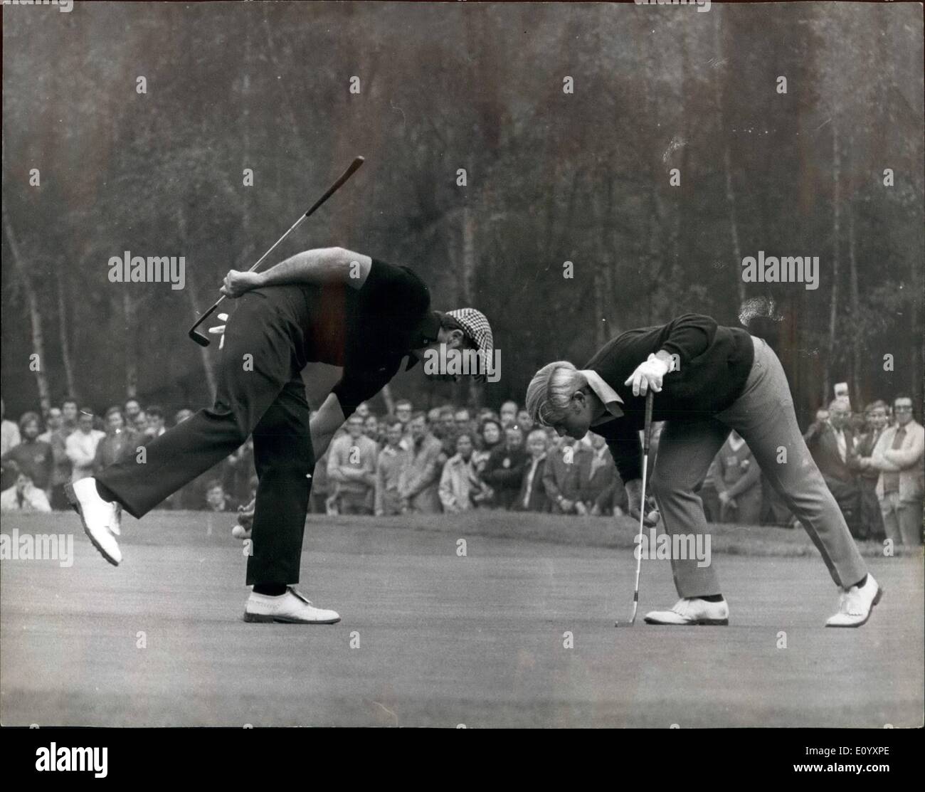 Oct. 10, 1971 - GARY PLAYER WINS THE PICADILLY WORLD MATCH - PLAY CHAMPIONSHIP. Springbok GARY PLAYER gained one of his greatest golfing triumphe yesterday, When he beat the American giant JACK NICKLAUS in the Piccadilly World Match Play Championship final at Wentworth Yesterday. PHOTO SHOWS:- A Simulatansous examination of the green by GARY PLAYER and JACK NICKLAUS, at Wentworth yesterday. Stock Photo