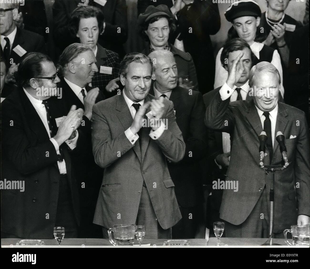 Oct. 10, 1971 - Mr. Heath speaks at the Tory conference at Brighton.: This morning Mr. Edward Heath the Prime Minister addressed the Conservative Party Conference on the final day. Photo shows Mr. Heath gives a wave at the end of his speech while members of the cabinet which includes Mr. Reginald Maudling, Home Secretary, left and Mr. Peter Thomas, Welsch Secretary centre. Stock Photo